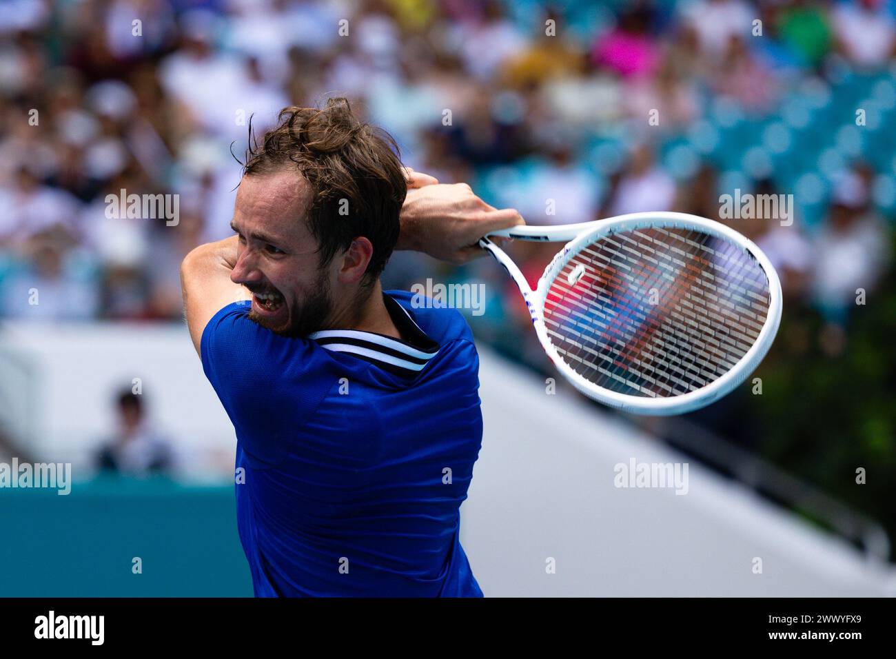 MIAMI GARDENS, FLORIDA - MARCH 26: Daniil Medvedev returns a shot against Dominik Koepfer of Germany during their match on Day 11 of the Miami Open at Hard Rock Stadium on March 26, 2024 in Miami Gardens, Florida. (Photo by Mauricio Paiz) Stock Photo