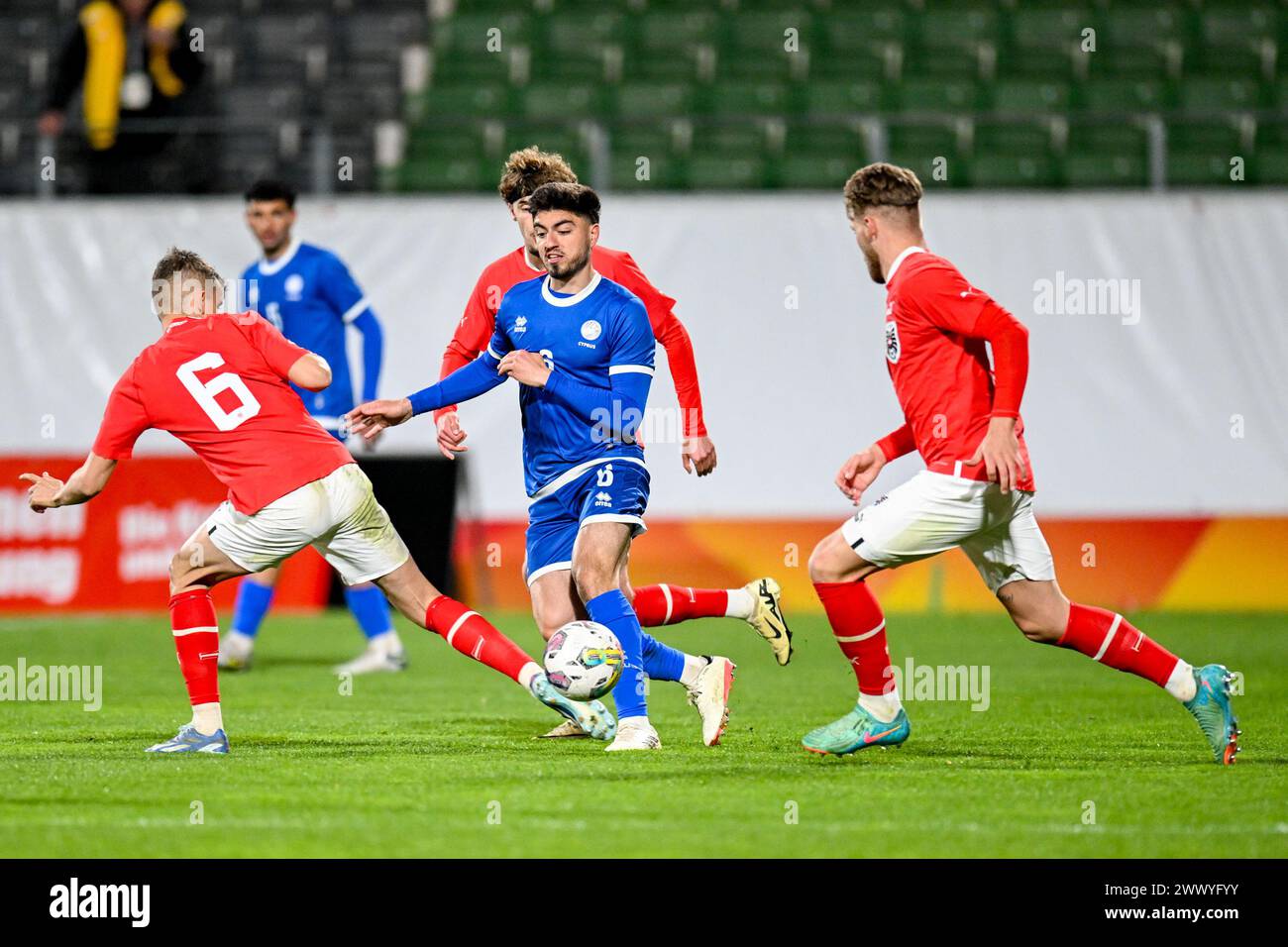 26.03.2024, Innviertel Arena Ried, AUT, U21 EM-Qualifikation 2025 - Oesterreich vs Zypern, im Bild Ervin Omic (AUT), Moritz Oswald (AUT) vs Georgios Okkas (CYP) .// Uefa U21 Euro 2025 Qualifikation Match between Austria and Cyprus in Ried, Austria on 2024/03/26 - 20240326 PD7189 Stock Photo