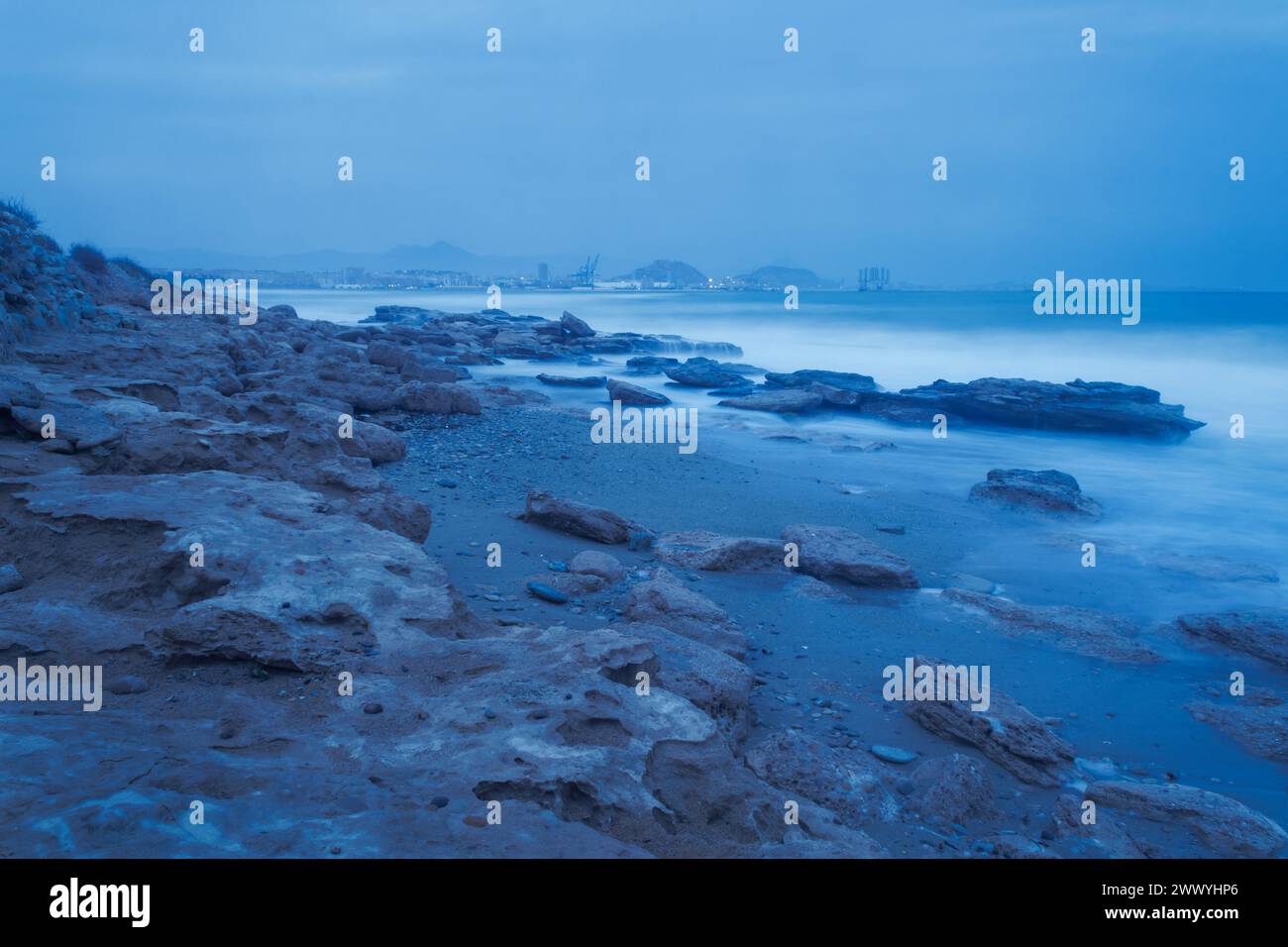 Long exposure on Agua Amar beach in Alicante during stormy weather. Spain Stock Photo