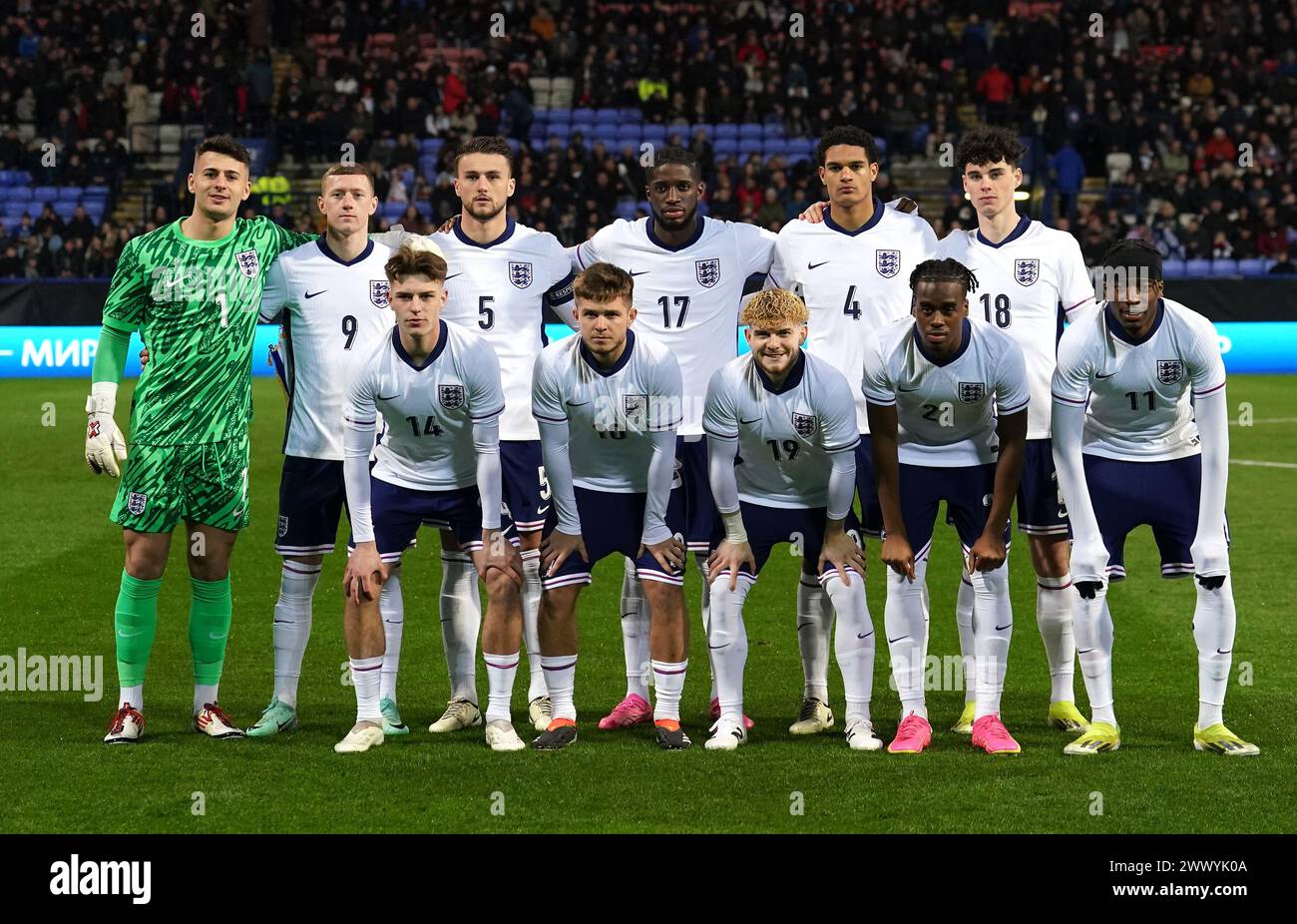 (left to right, back to front) England goalkeeper Sam Tickle, Jay Stansfield, Taylor Harwood-Bellis, Samuel Iling Junior, Jarell Quansah, Archie Gray, Alex Scott, James McAtee, Harvey Elliott, Jamie Bynoe-Gittens and Noni Madueke before the UEFA Euro U21 Championship qualifying Group F match at the Toughsheet Community Stadium, Horwich. Picture date: Tuesday March 26, 2024. Stock Photo