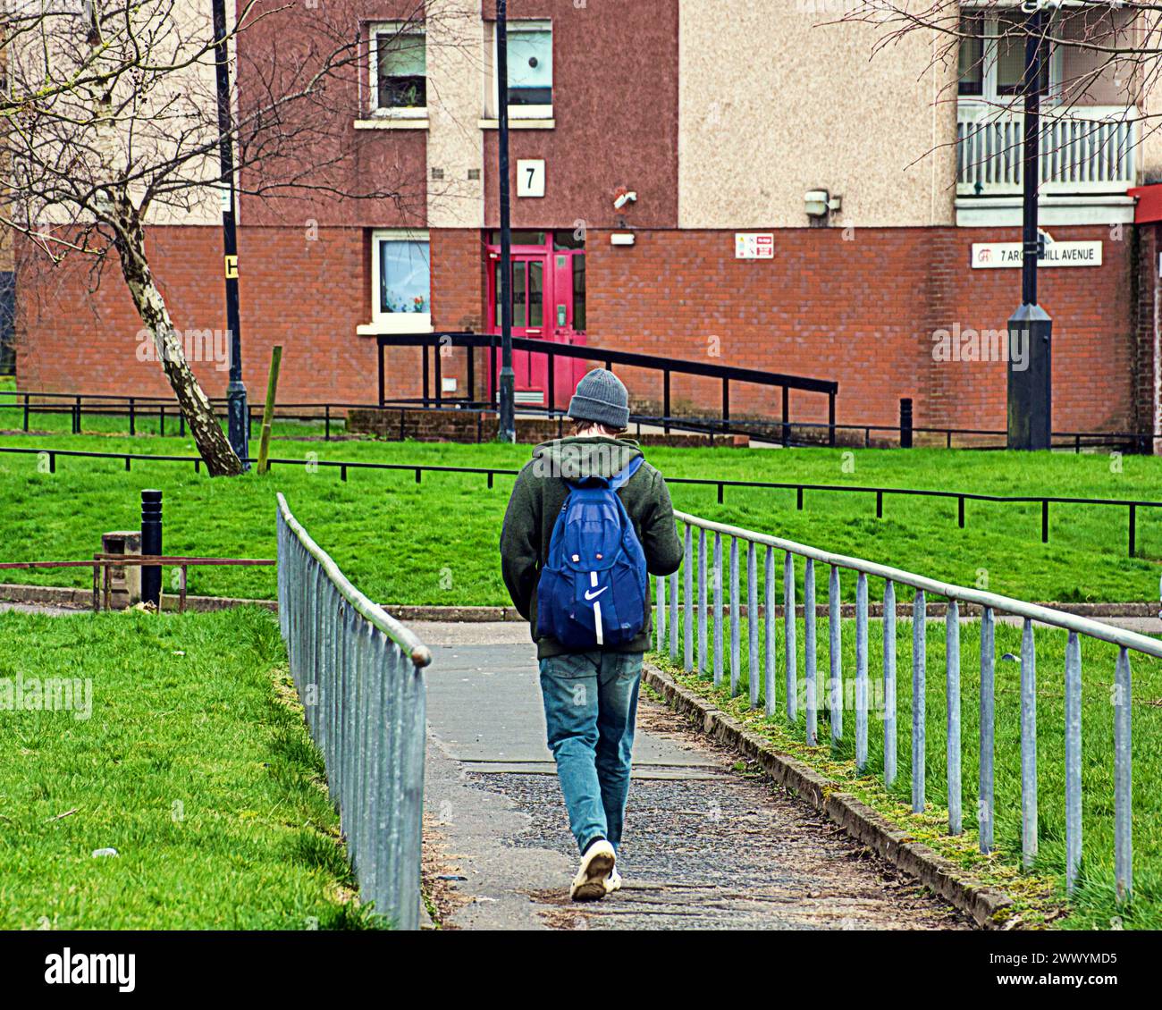 Glasgow, Scotland, UK. 26th March, 2024: UK Weather: kid coming home from school.  Sunny spring weather in the city saw locals and tourists on the streets of the city centre. Poverty in drumchapel. Credit Gerard Ferry/Alamy Live News Stock Photo