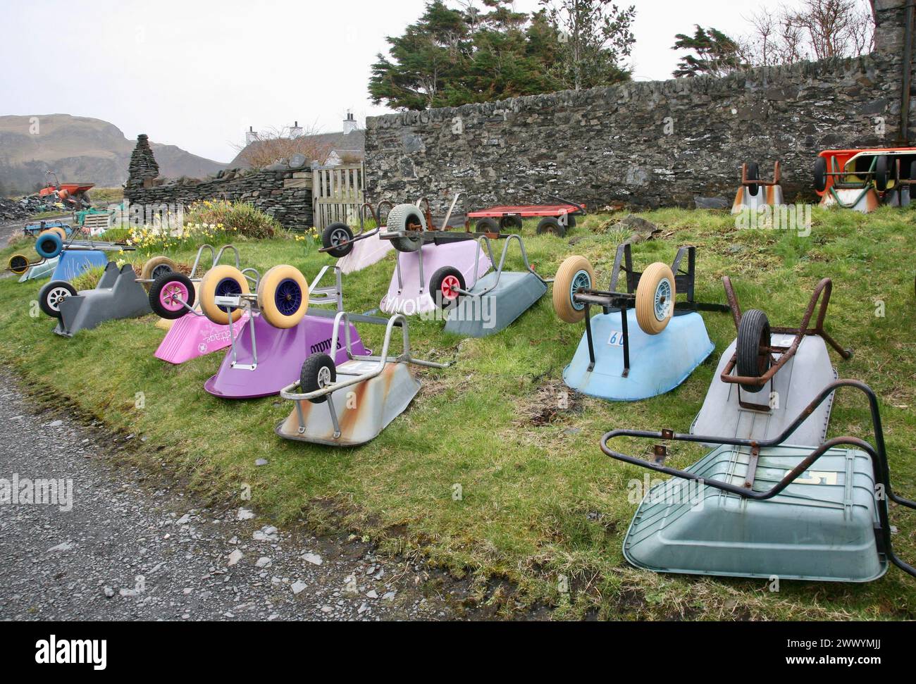 A view of all the wheelbarrows, waiting at the port, on Easdale Island, Seil Island, Argyll and Bute, Scotland, Europe on Tuesday, 19th, March, 2024. Stock Photo