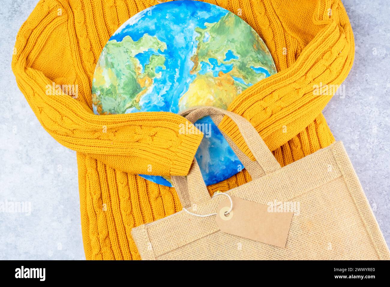 Creative concept buy less and overconsumption. Responsible consumption. Save the planet. top view Stock Photo