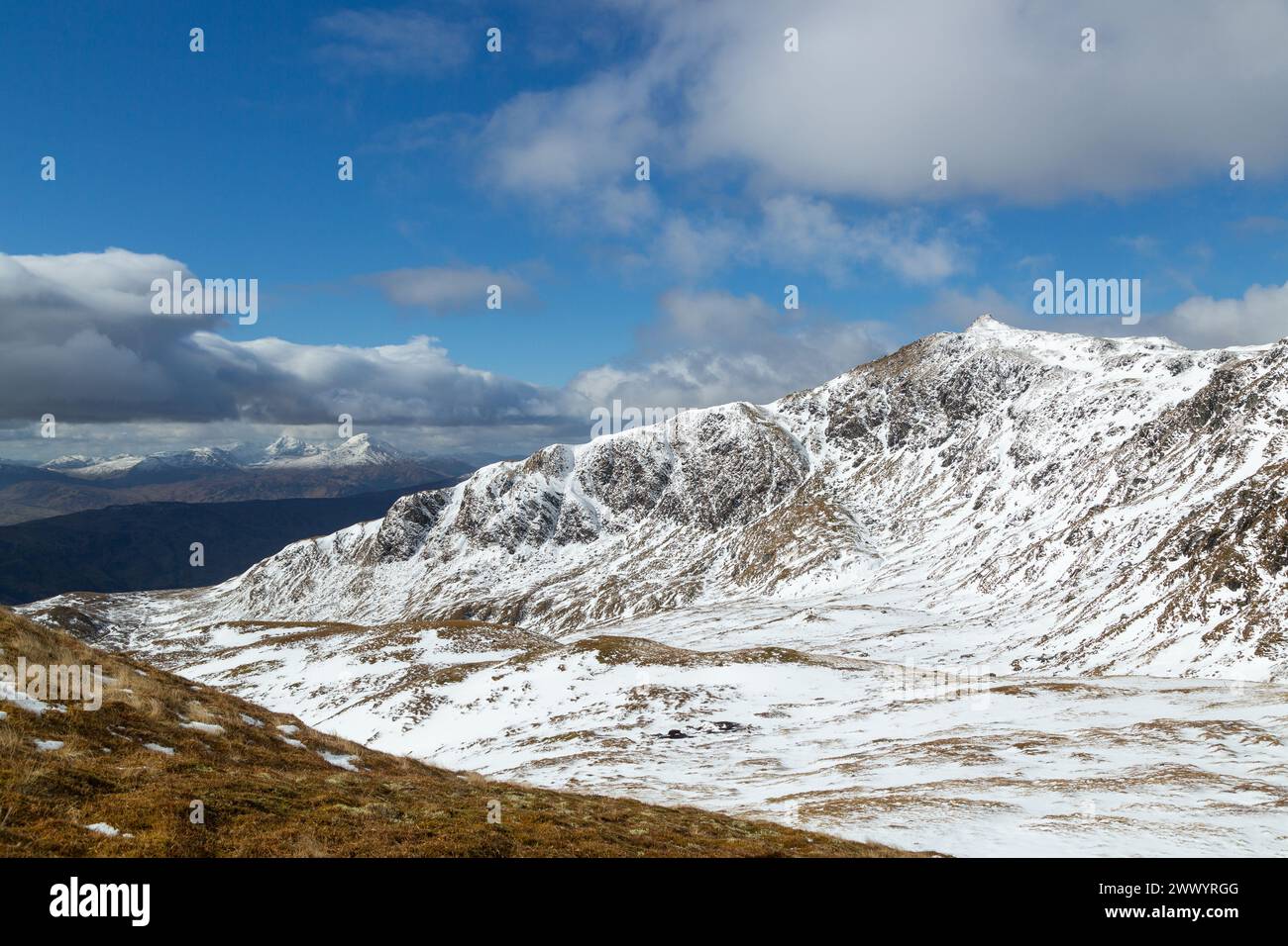 Looking to the rocky ridge of Meall Garbh from the ascent of Meall nan Tarmachan Stock Photo