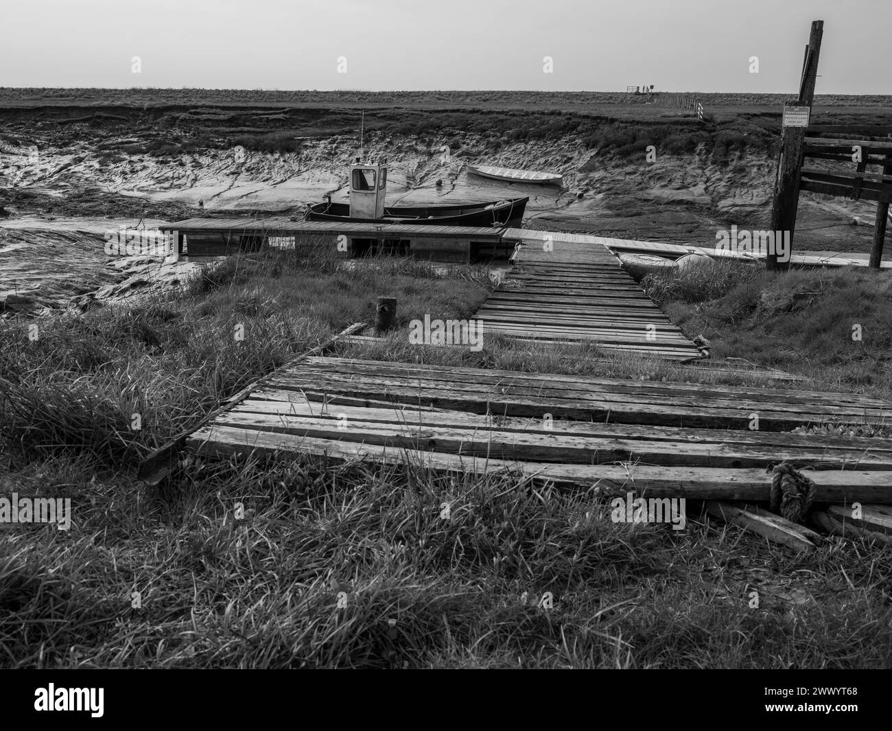 March 2024 - Small boats at low tide. Uphill, Weston supe Mare, North