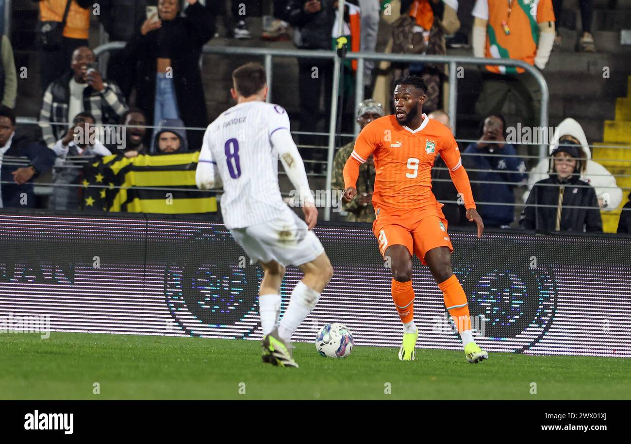 France. 26th Mar, 2024. © PHOTOPQR/VOIX DU NORD/MATTHIEU BOTTE ; 26/03/2024 ; 26/03/2024. Lens. FOOTBALL. Match amical Cote d'ivoire - Uruguay au stade bollaert delelis. Jonathan bamba. PHOTO MATTHIEU BOTTE LA VOIX DU NORD Lens, France, march 26th 2024 friendly soccer match between Ivoiry Coast and Uruguay Credit: MAXPPP/Alamy Live News Stock Photo