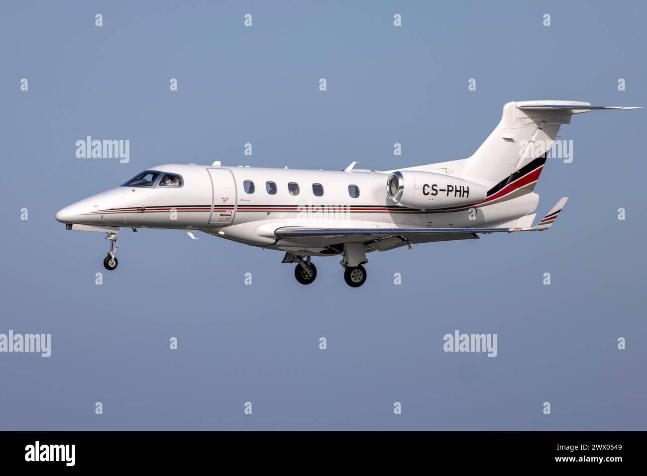NetJets Embraer EMB 505 Phenom 300 REG CS PHH On Shirt Finals Runway NetJets Embraer EMB 505 Phenom 300 REG CS PHH On Shirt Finals Runway