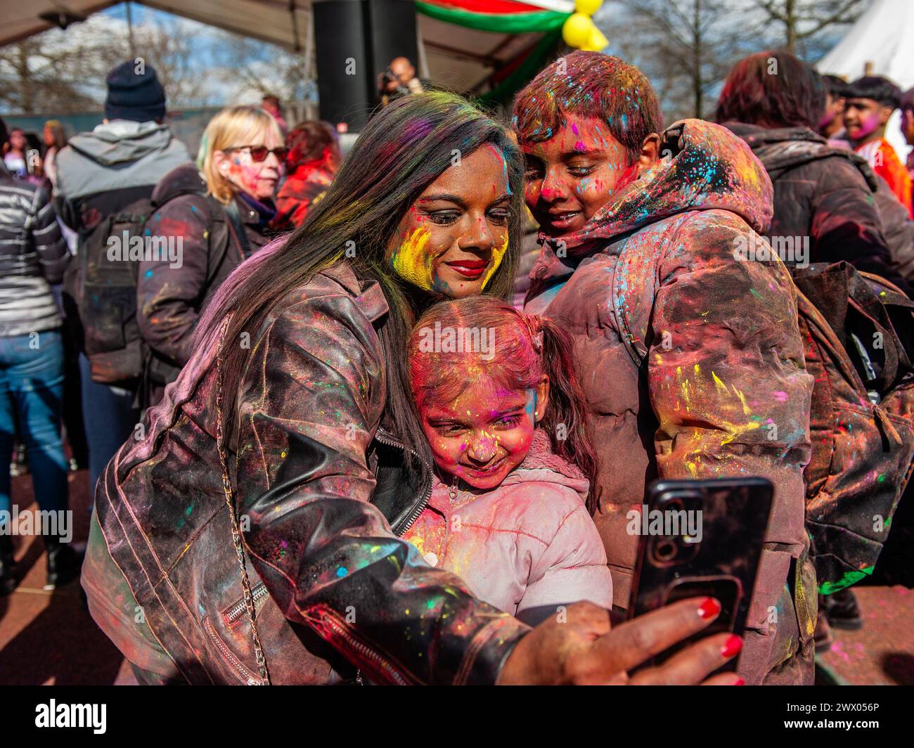 Millions of people worldwide celebrate the annual Holi Hangámá Festival, also known as the Festival of Colours, which means celebrating the arrival of Spring. In The Hague, where the largest Indian population in Europe can be found, a big celebration occurred in the multicultural Transvaal neighborhood, where participants threw brightly colored powder on themselves and at each other. People celebrated this event by walking around the neighborhood singing and dancing in a colorful procession. (Photo by /Sipa USA) Credit: Sipa USA/Alamy Live News Stock Photo