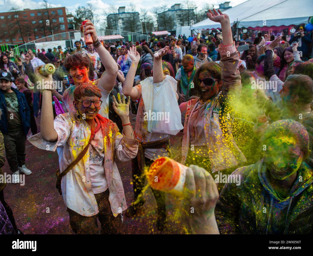 Millions of people worldwide celebrate the annual Holi Hangámá Festival, also known as the Festival of Colours, which means celebrating the arrival of Spring. In The Hague, where the largest Indian population in Europe can be found, a big celebration occurred in the multicultural Transvaal neighborhood, where participants threw brightly colored powder on themselves and at each other. People celebrated this event by walking around the neighborhood singing and dancing in a colorful procession. (Photo by /Sipa USA) Credit: Sipa USA/Alamy Live News Stock Photo