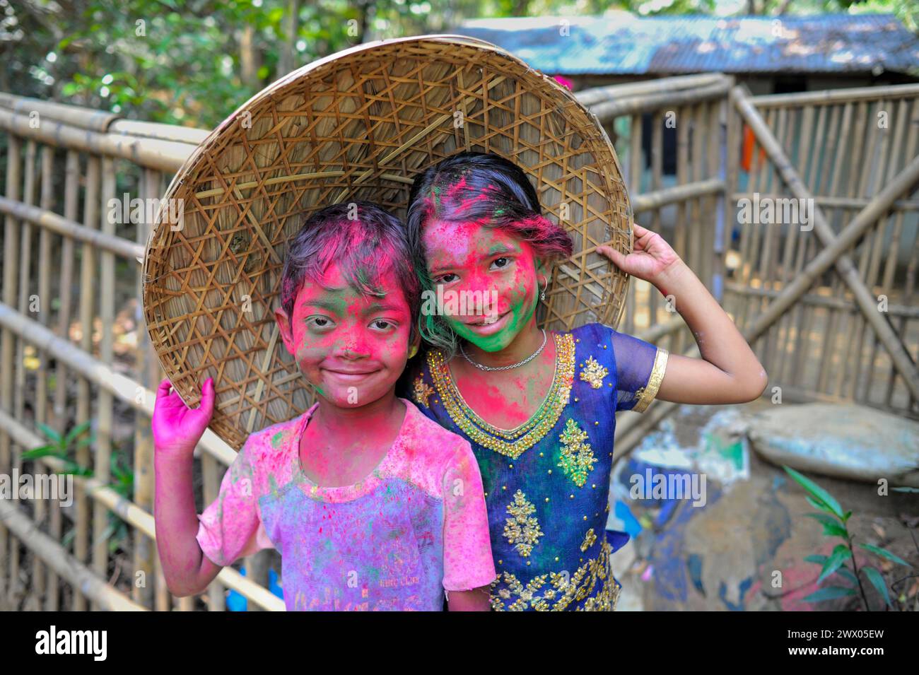 Sylhet, Bangladesh. 26th Mar, 2024. Children portrait with their faces painted with colored powder celebrating the annual Hindu festival of colors, known as Holi festival, marking the onset of spring. on March 26, 2024, Sylhet, Bangladesh. (Credit Image: © Md Rafayat Haque Khan/eyepix via ZUMA Press Wire) EDITORIAL USAGE ONLY! Not for Commercial USAGE! Stock Photo