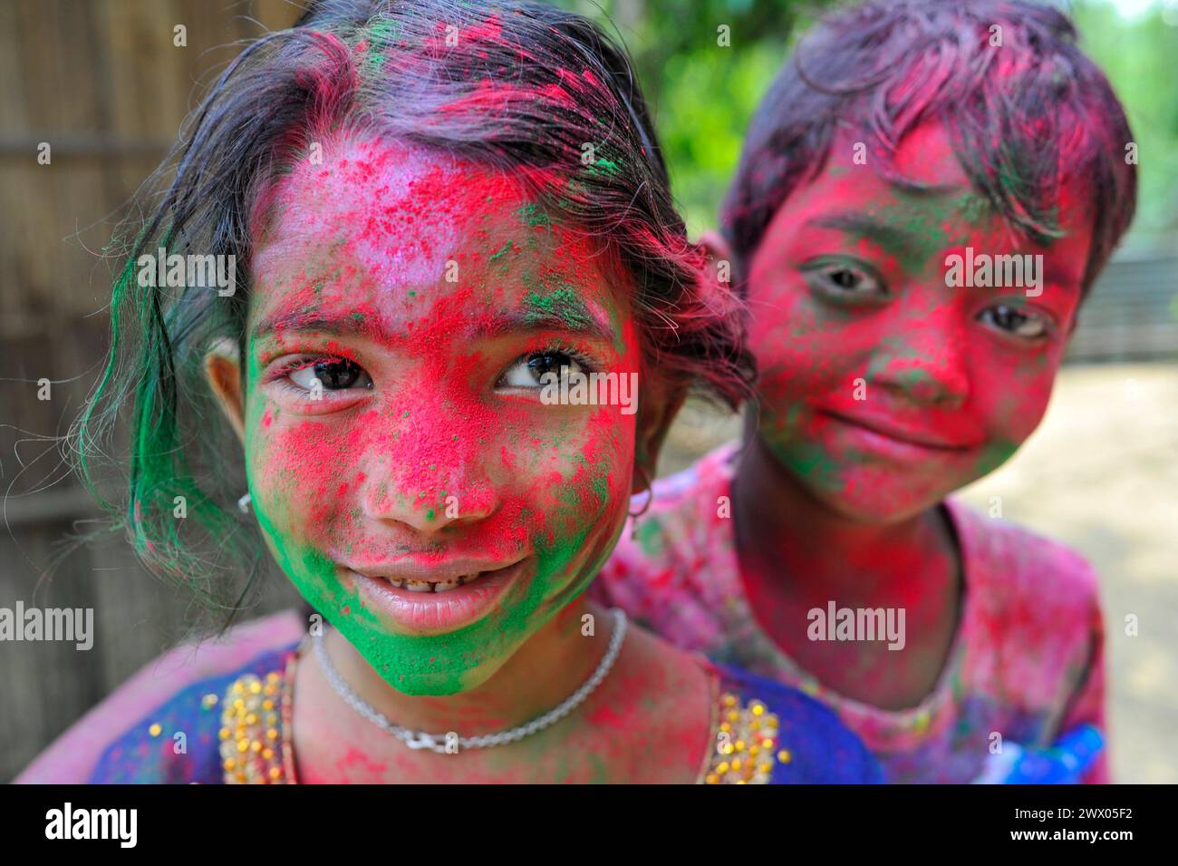 Sylhet, Bangladesh. 26th Mar, 2024. Children portrait with their faces painted with colored powder celebrating the annual Hindu festival of colors, known as Holi festival, marking the onset of spring. on March 26, 2024, Sylhet, Bangladesh. (Credit Image: © Md Rafayat Haque Khan/eyepix via ZUMA Press Wire) EDITORIAL USAGE ONLY! Not for Commercial USAGE! Stock Photo