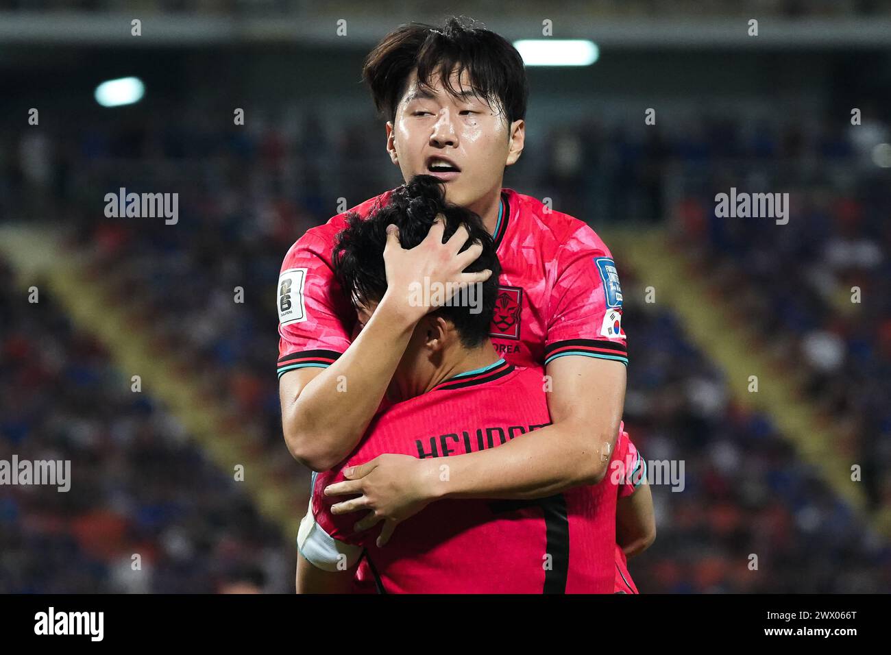 Bangkok, Thailand. 26th Mar, 2024. Lee Kang-in (top) and Son Heung-min #7 of South Korea celebrate after a goal during the FIFA World Cup 2026 Qualifiers Group C match between Thailand and South Korea at Rajamangala National stadium in Bangkok. Final score; Thailand 0 : 3 South Korea. Credit: SOPA Images Limited/Alamy Live News Stock Photo