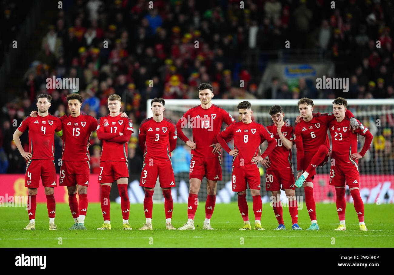 Wales players dejected following the UEFA Euro 2024 Qualifying play-off final at Cardiff City Stadium, Cardiff. Picture date: Tuesday March 26, 2024. Stock Photo
