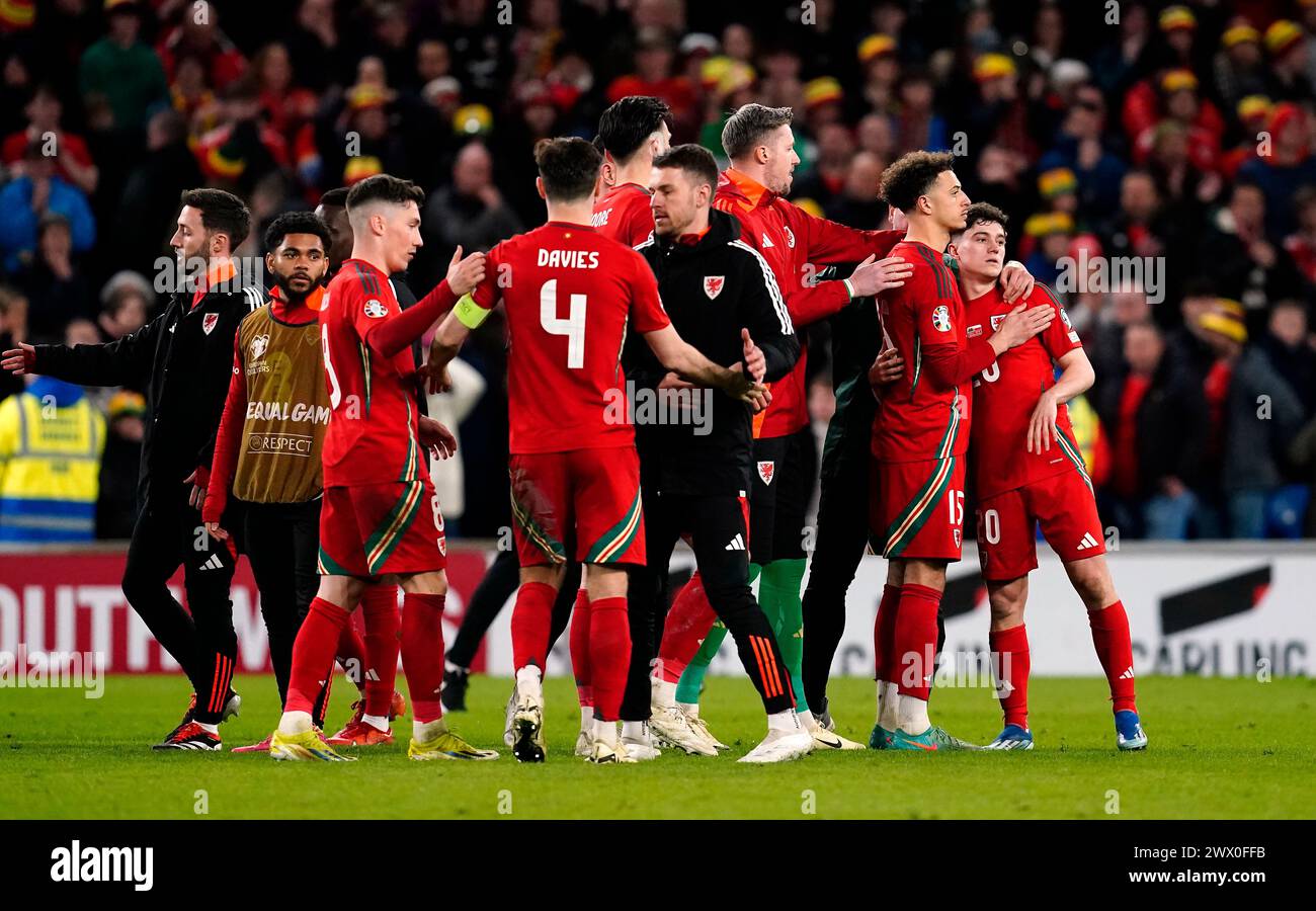 Wales' Daniel James is consoled after missing the decisive penalty in the shoot out during the UEFA Euro 2024 Qualifying play-off final at the Cardiff City Stadium, Wales. Picture date: Tuesday March 26, 2024. Stock Photo