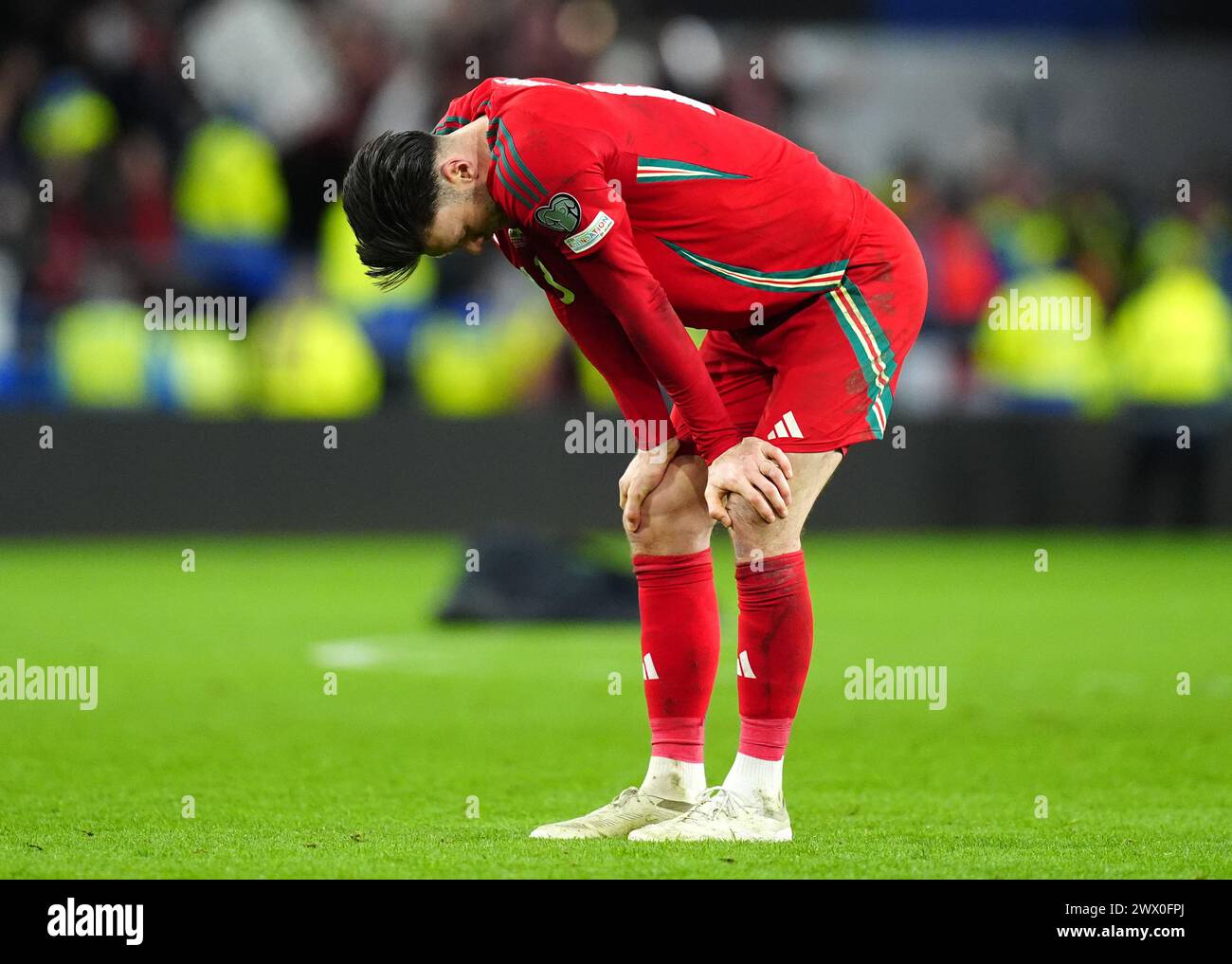 Wales' Kieffer Moore dejected following the UEFA Euro 2024 Qualifying play-off final at Cardiff City Stadium, Cardiff. Picture date: Tuesday March 26, 2024. Stock Photo