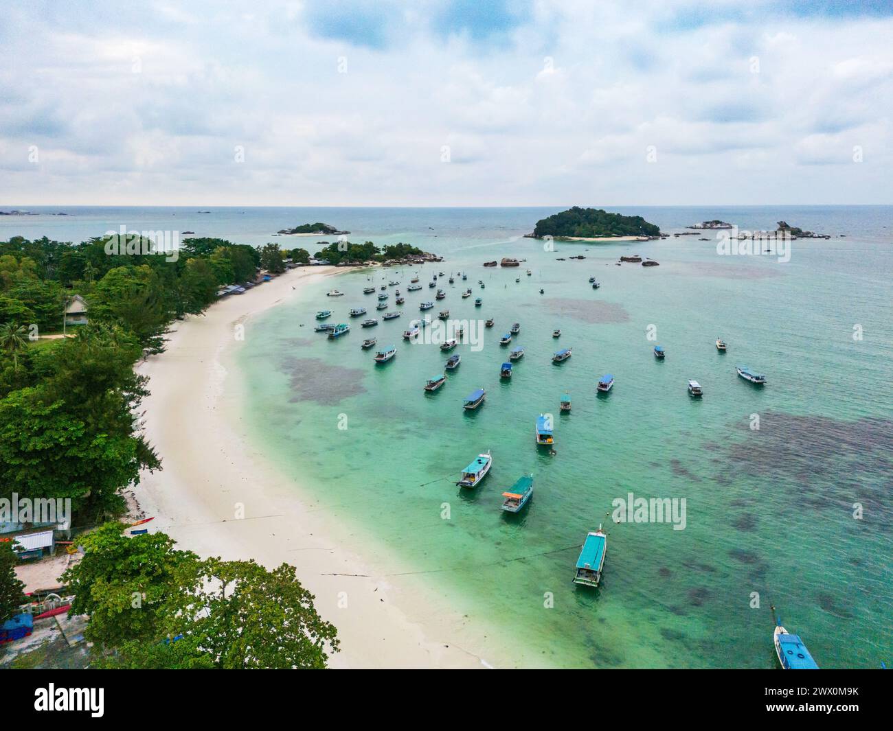 Belitung Kelayang beach and boats drone view. Beautiful aerial view of islands, sea and rocks in Belitung, Indonesia  Stock Photo