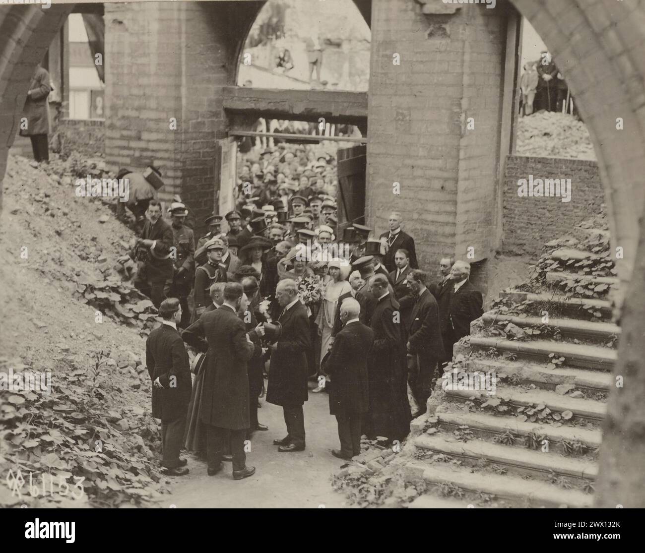 President and Mrs. Wilson, King and Queen of Belgium about to enter what was once the finest library in the world. Destroyed by the Germans. Louvain, Belgium ca. 1919 Stock Photo
