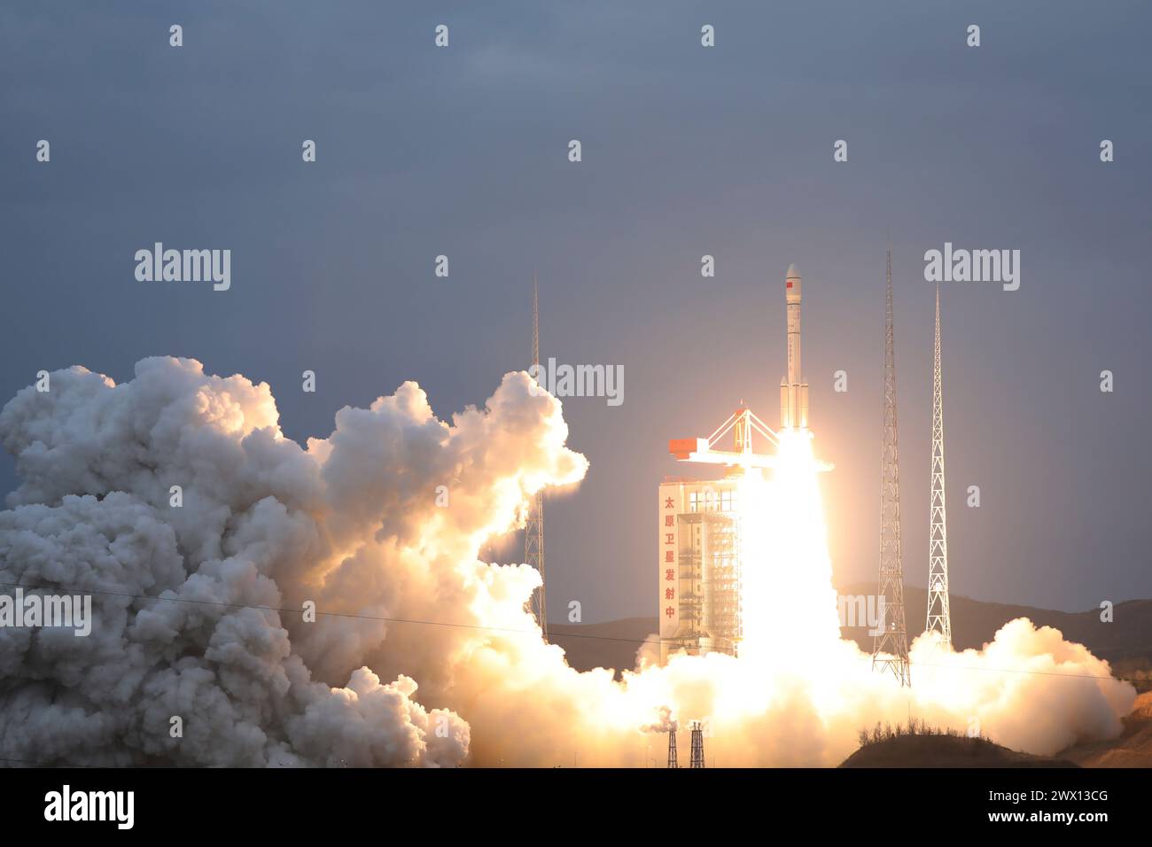 Beijing, China. 27th Mar, 2024. A modified version of a Long March-6 rocket carrying the Yunhai-3 02 satellite lifts off from the Taiyuan Satellite Launch Center in north China's Shanxi Province, March 27, 2024. The satellite has entered the preset orbit and will be used for atmospheric and marine environment surveys, space environment monitoring, disaster prevention and reduction, and scientific experiments. Credit: Zheng Bin/Xinhua/Alamy Live News Stock Photo