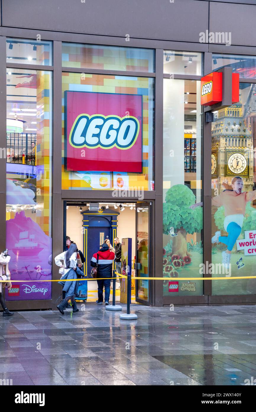 London, UK - March 22, 2024 :  The LEGO Store, Leicester Square, London. The LEGO Group is a Danish construction toy production company based in Billu Stock Photo