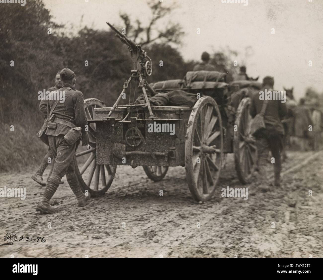 With anti-aircraft protection handy, an American field artillery battery pushes forward toward the Argonne front lines ca. 1918 Stock Photo