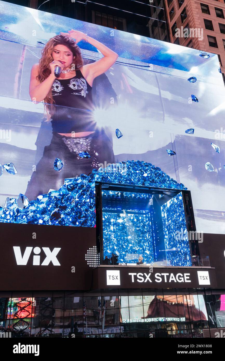 Shakira performs on balcony of TSX Broadway on Times Square in New York