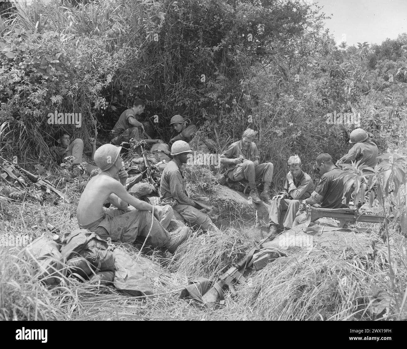 Vietnam War: Members of Companies B and D, 1st Battalion, 501st Infantry, Regiment, 101st Airborne Division, take a break from jungle fighting east of Tam Ky ca. 1969 Stock Photo