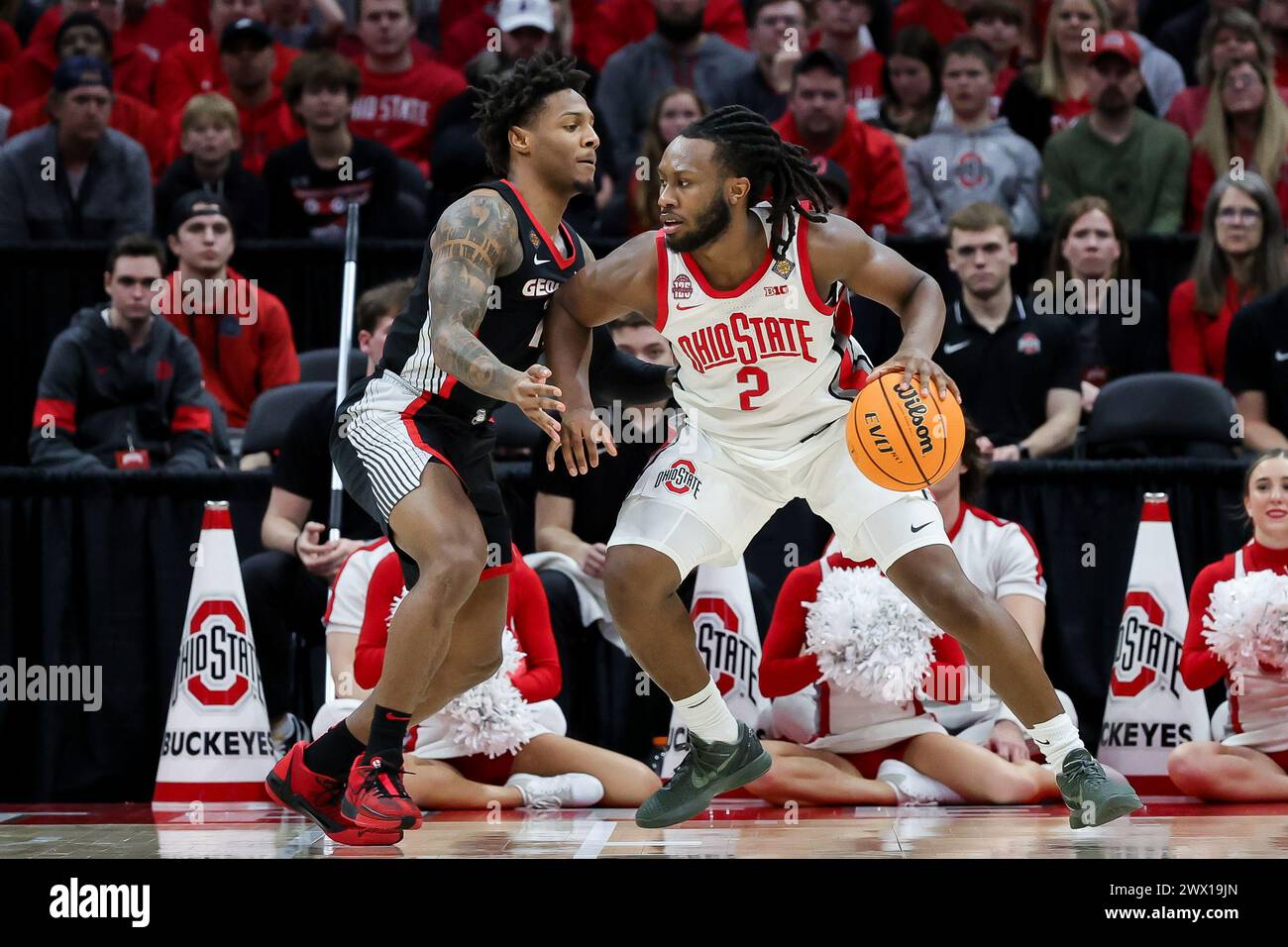 Columbus, Ohio, USA. 26th Mar, 2024. Ohio State Buckeyes guard Bruce Thornton (2) drives the baseline against Georgia Bulldogs guard Justin Hill (11) during the game between the Georgia Bulldogs and the Ohio State Buckeyes at Ohio Stadium, Columbus, Ohio. (Credit Image: © Scott Stuart/ZUMA Press Wire) EDITORIAL USAGE ONLY! Not for Commercial USAGE! Stock Photo