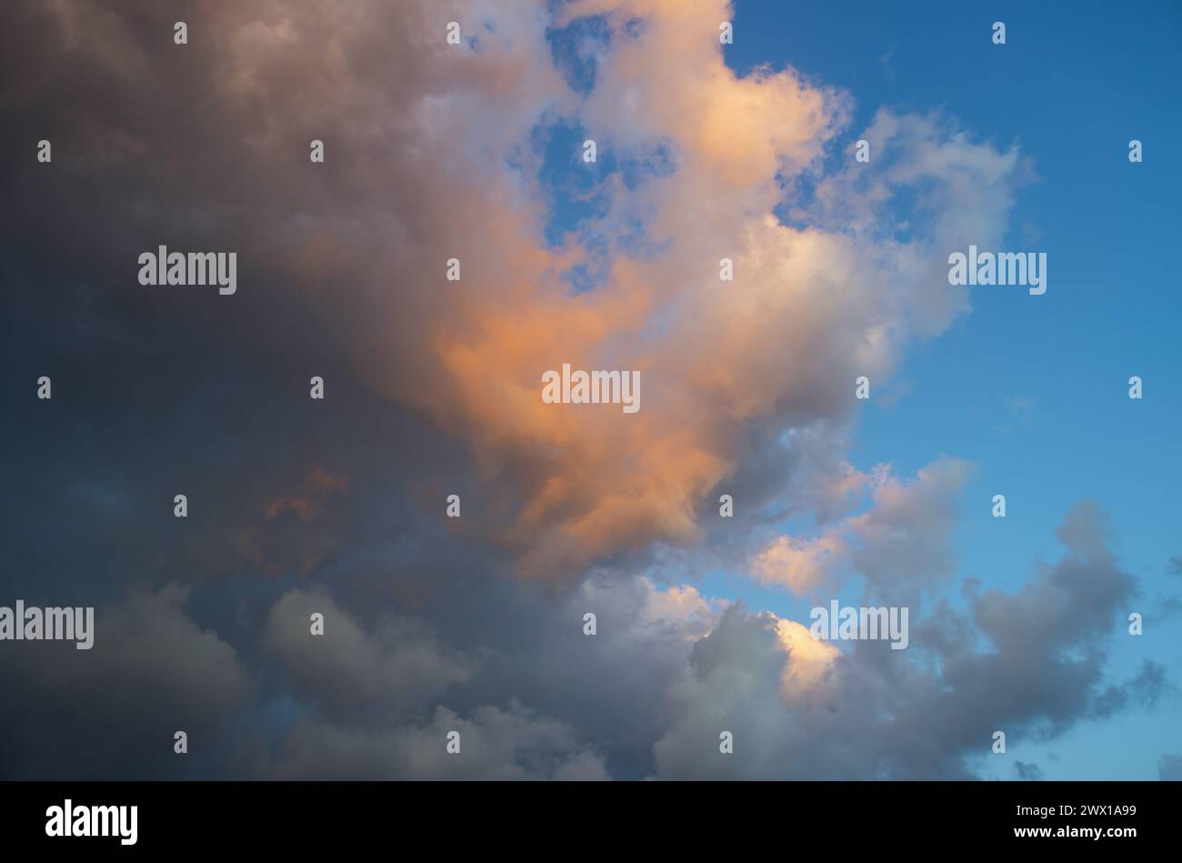 beautiful sky with dramatic clouds at sunset background Stock Photo