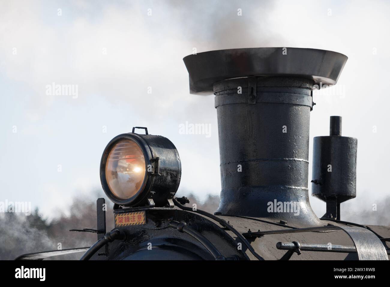 Lamp and chimney on steam train Stock Photo