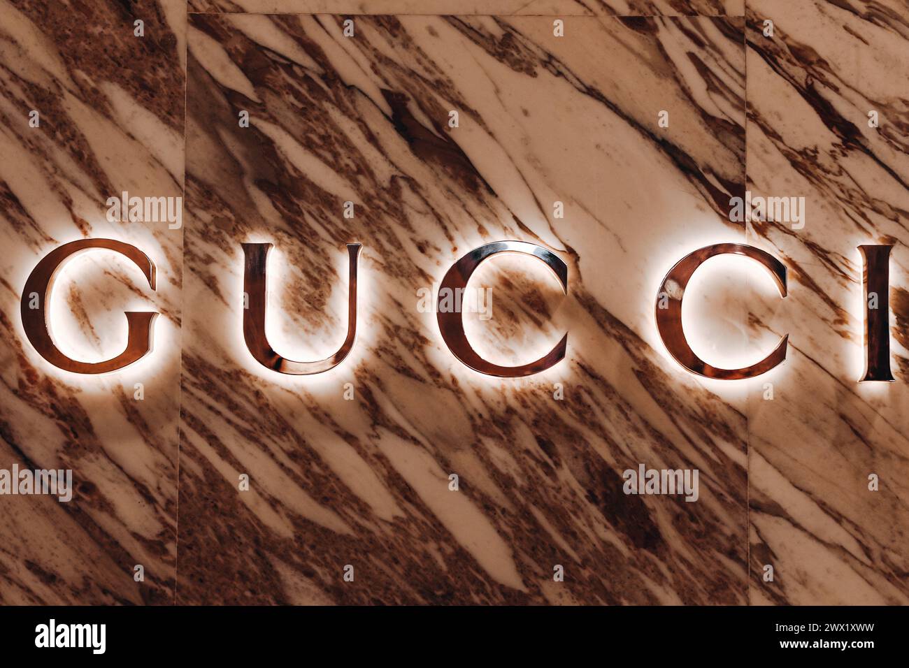 Gucci logo golden shiny. Gucci is an Italian fashion and leather goods ...