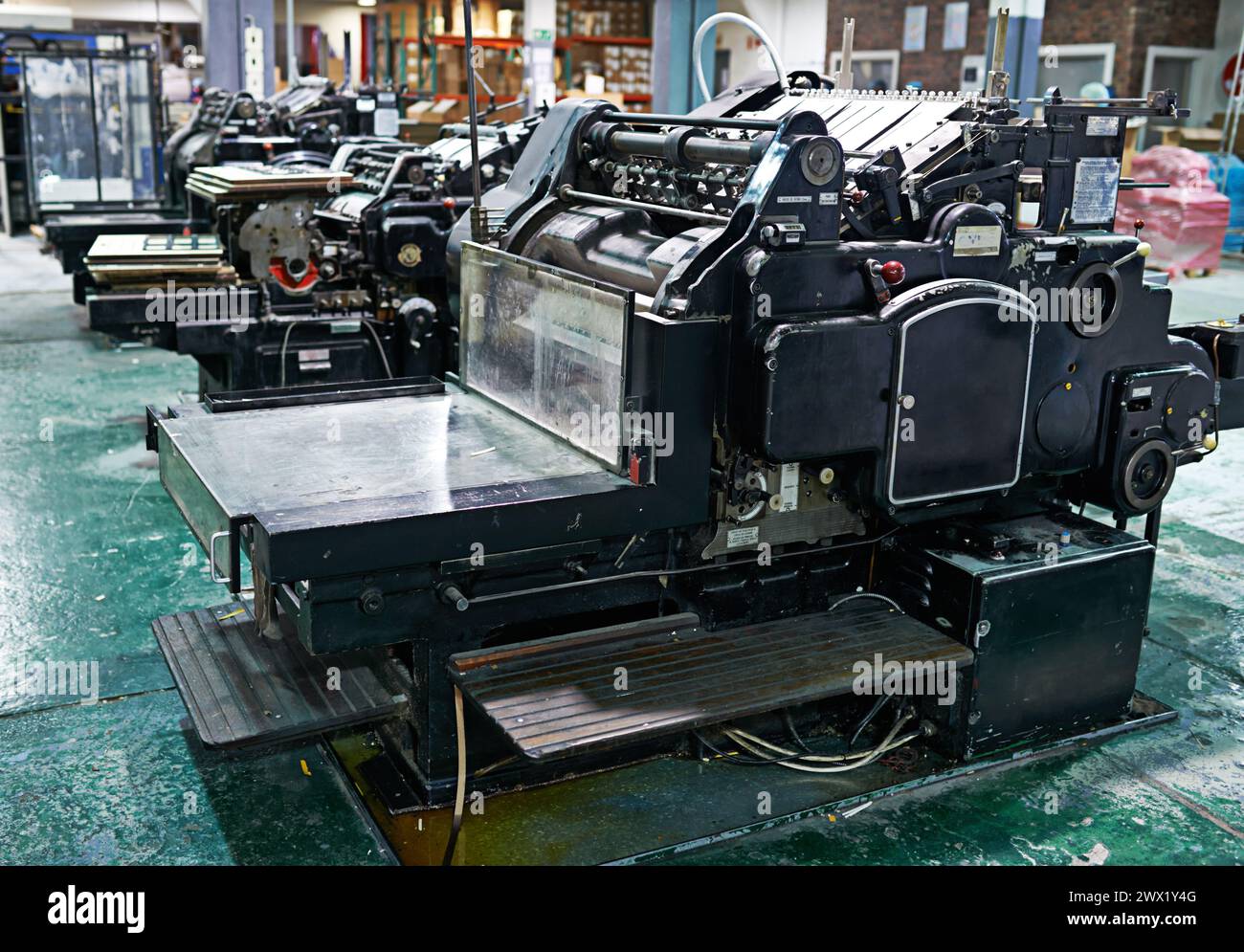 Vintage, printing and manufacturing in factory for newspaper production in business with automated system. Antique, press and industry in plant for Stock Photo