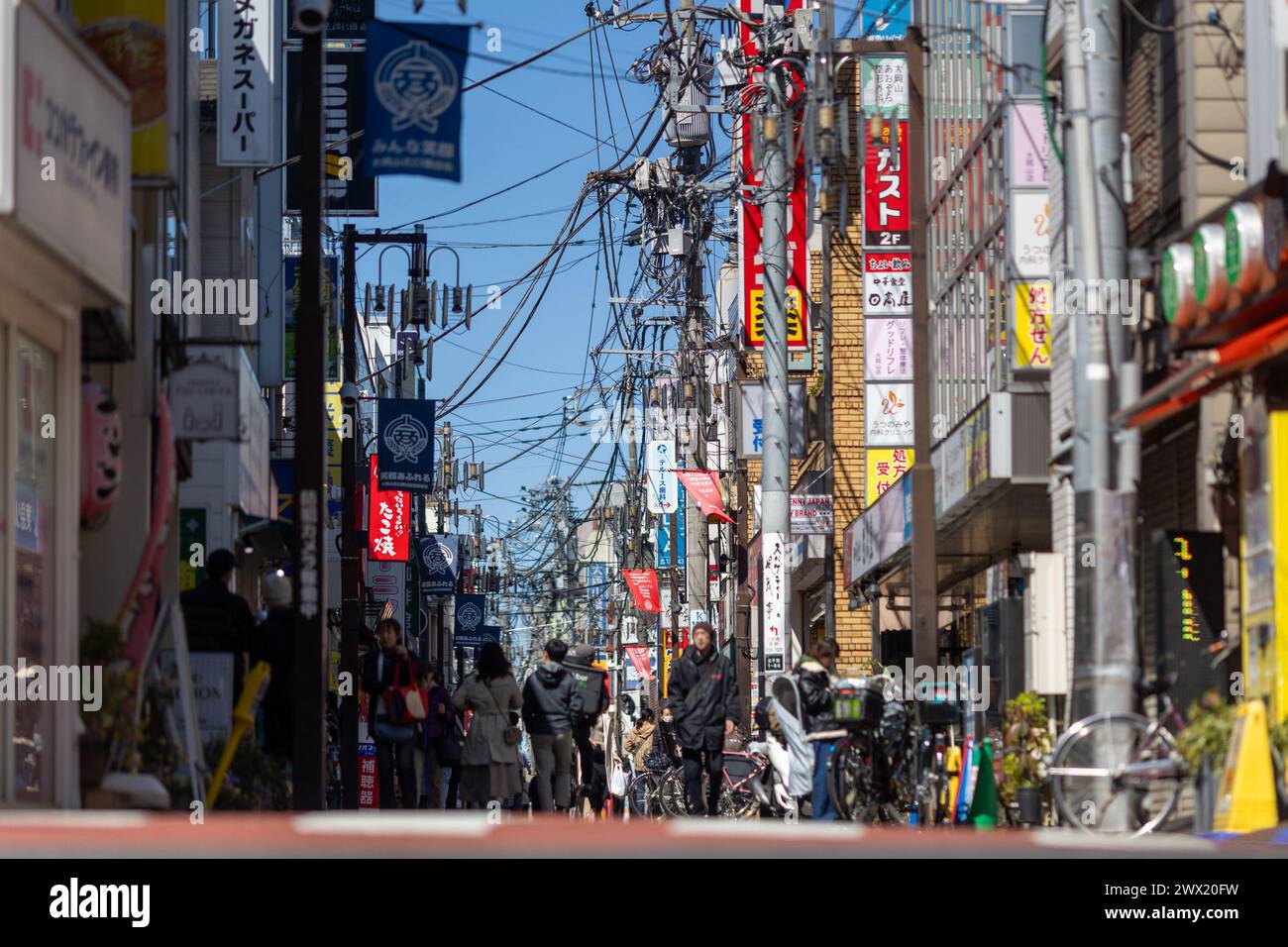 Tokyo, Japan. 27th Mar, 2024. Members of the public enjoy sunny weather