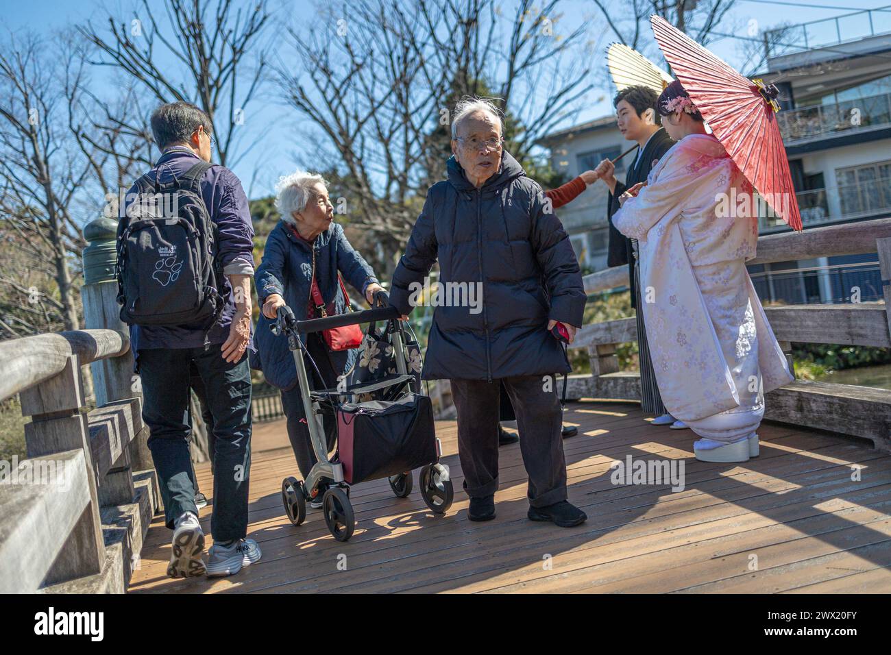 Tokyo, Japan. 27th Mar, 2024. Members of the public enjoy sunny weather