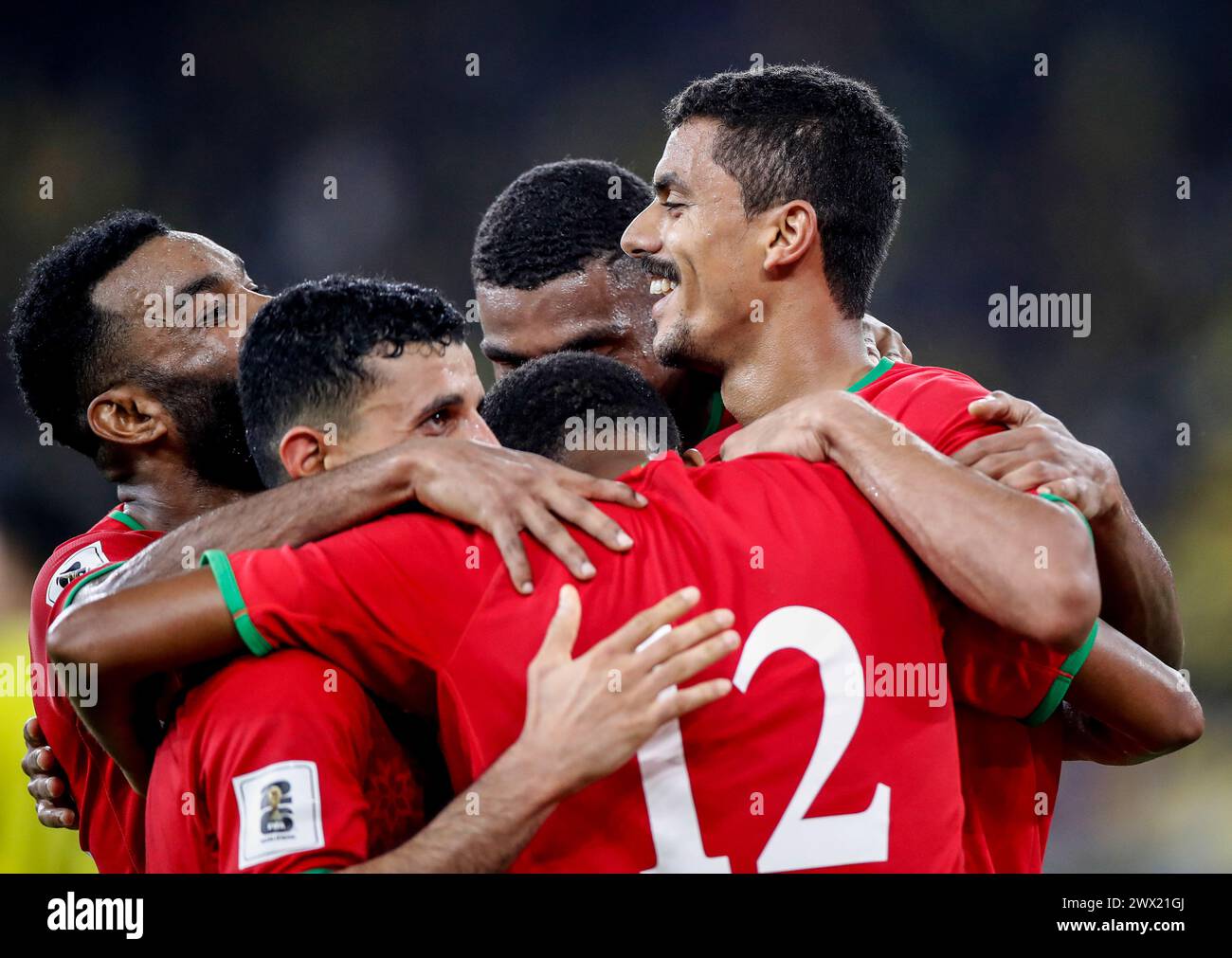 Players of Oman celebrate after scoring a goal during the 2026 World