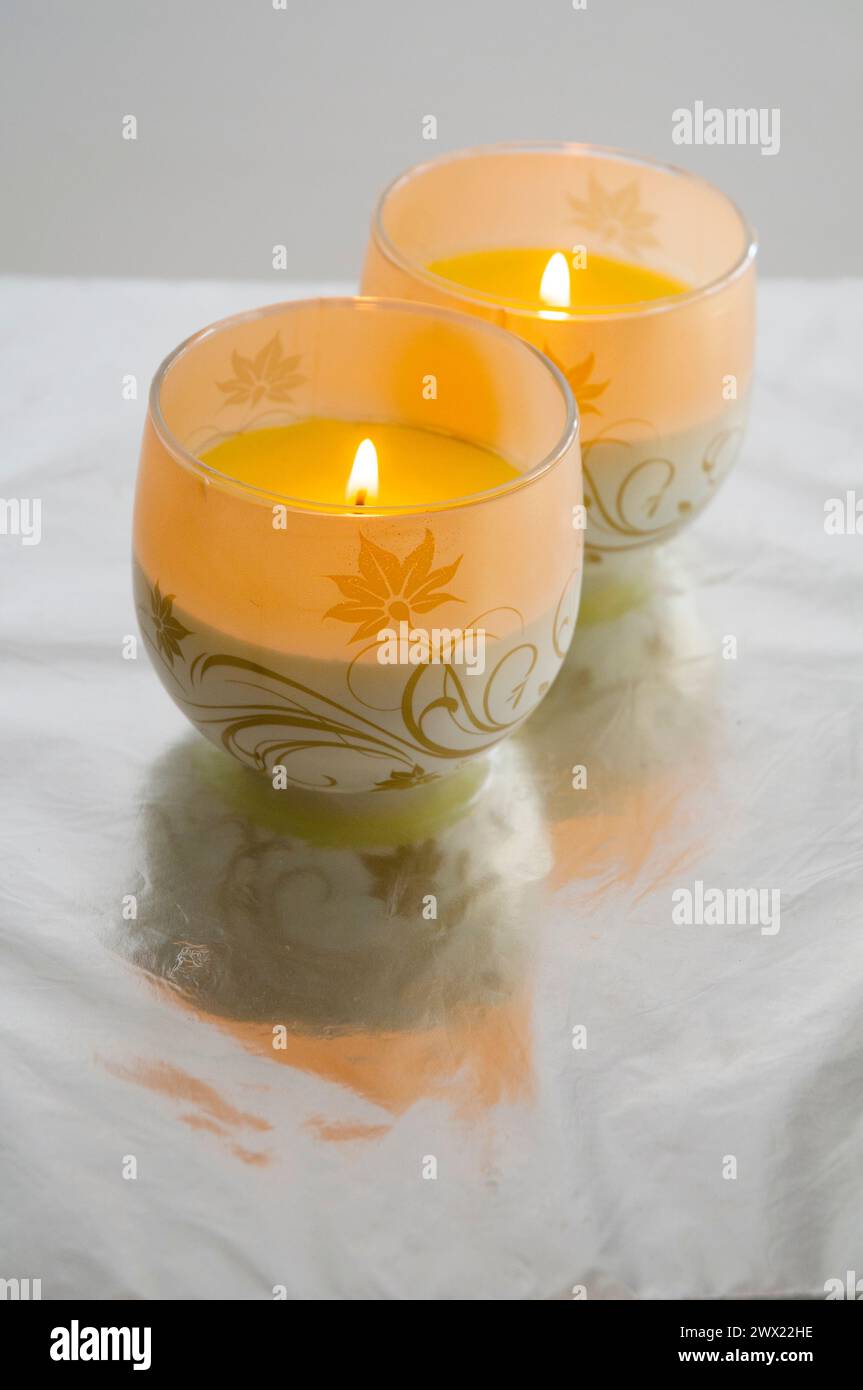Two lit up candles. Stock Photo