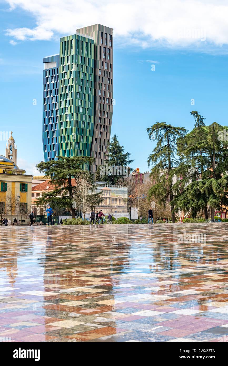 Reflections on wet floor in Skanderbeg Square in Tirana Stock Photo