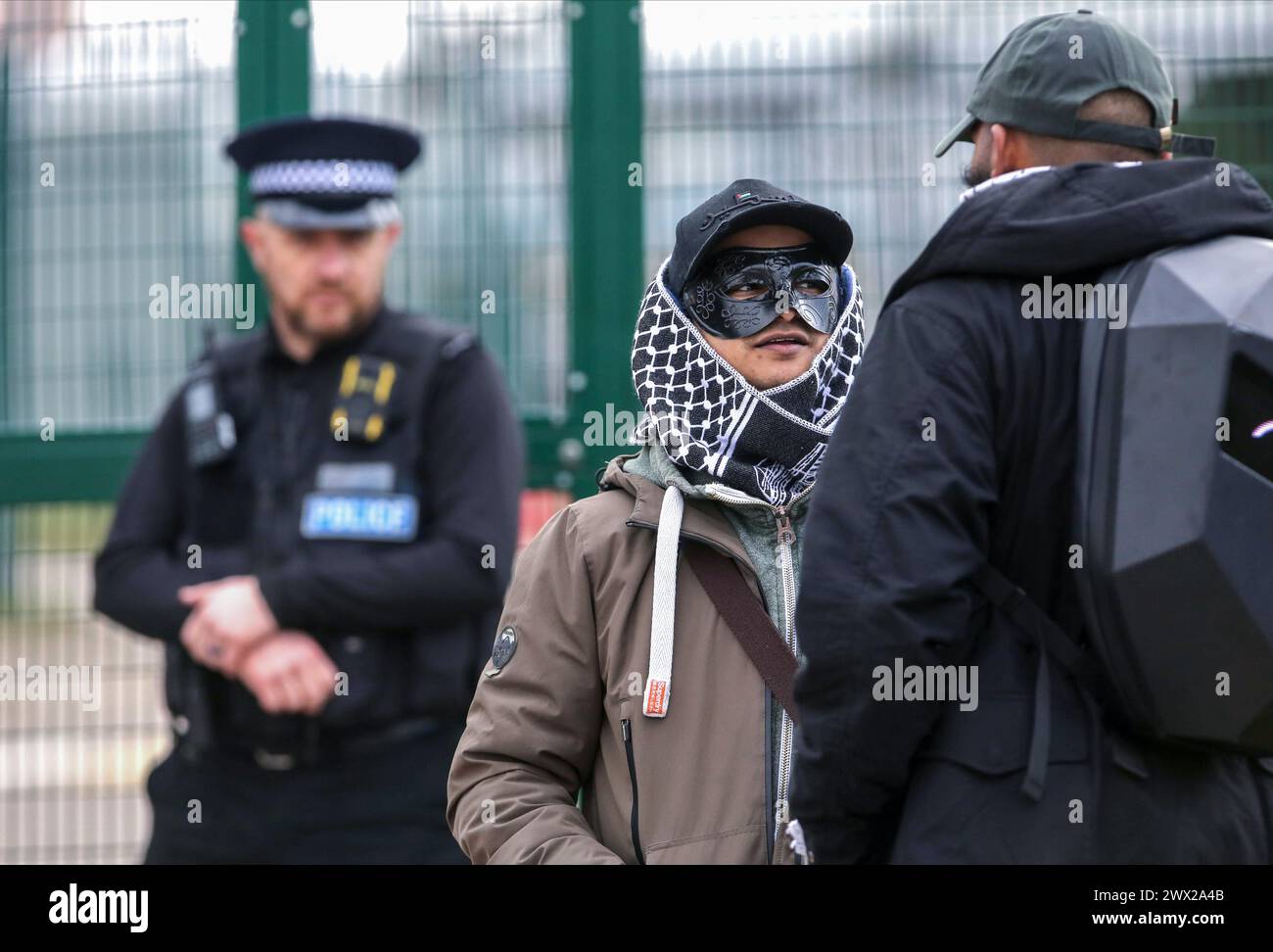 Sandwich, UK. 26th Mar, 2024. Supporters of those involved in the action talk outside one of the access gates watched by a police officer during the demonstration. Instro Precision provide components for Elbit Systemís weaponry. Palestine Action continues to target subsidiary companies of Israeli arms company Elbit Systems in an attempt to isolate them and make business impossible. This tactic has caused two of Elbit's ten main businesses to close in the UK and several partner companies to cut ties with them. Credit: SOPA Images Limited/Alamy Live News Stock Photo