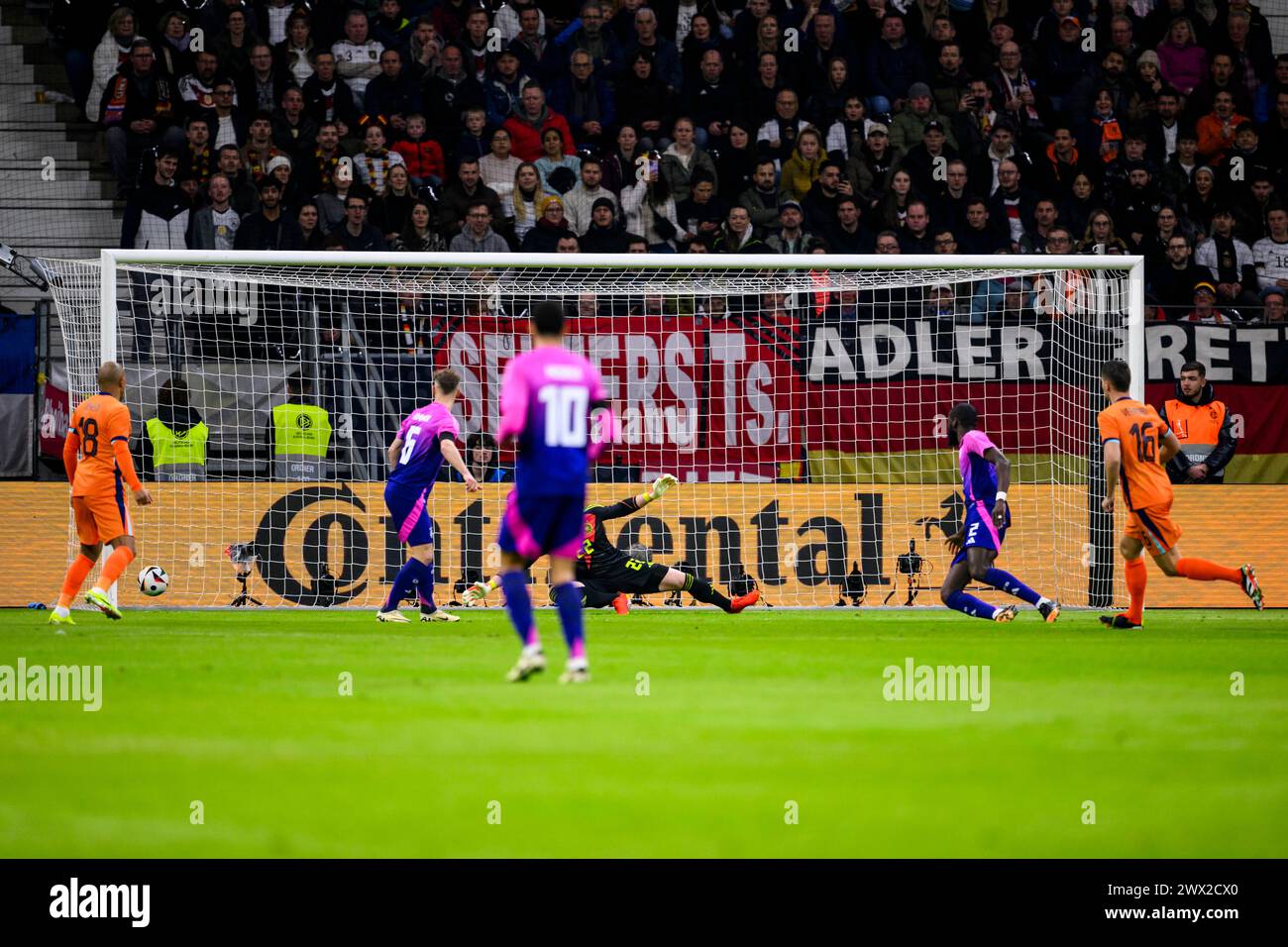 26 March 2024, Hesse, Frankfurt/M.: Soccer: International match, Germany - Netherlands, Deutsche Bank Park. The Netherlands' Joey Veerman (r) scores the goal to make it 0:1 against Germany's Antonio Rüdiger (2nd from right). Photo: Tom Weller/dpa Stock Photo