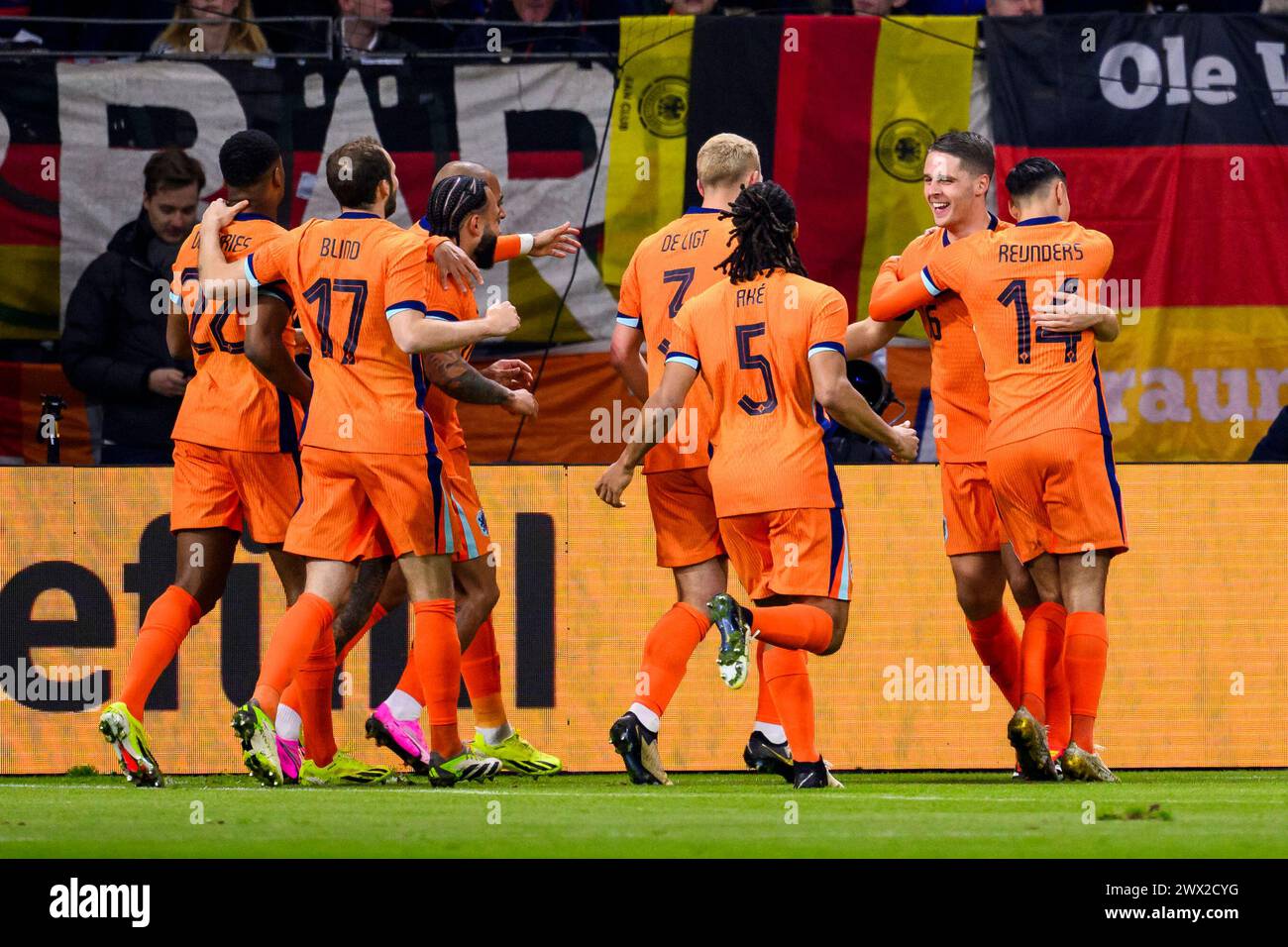 26 March 2024, Hesse, Frankfurt/M.: Soccer: International match, Germany - Netherlands, Deutsche Bank Park. The Netherlands' Joey Veerman (2nd from right) celebrates with the team after his goal to make it 0:1. Photo: Tom Weller/dpa Stock Photo