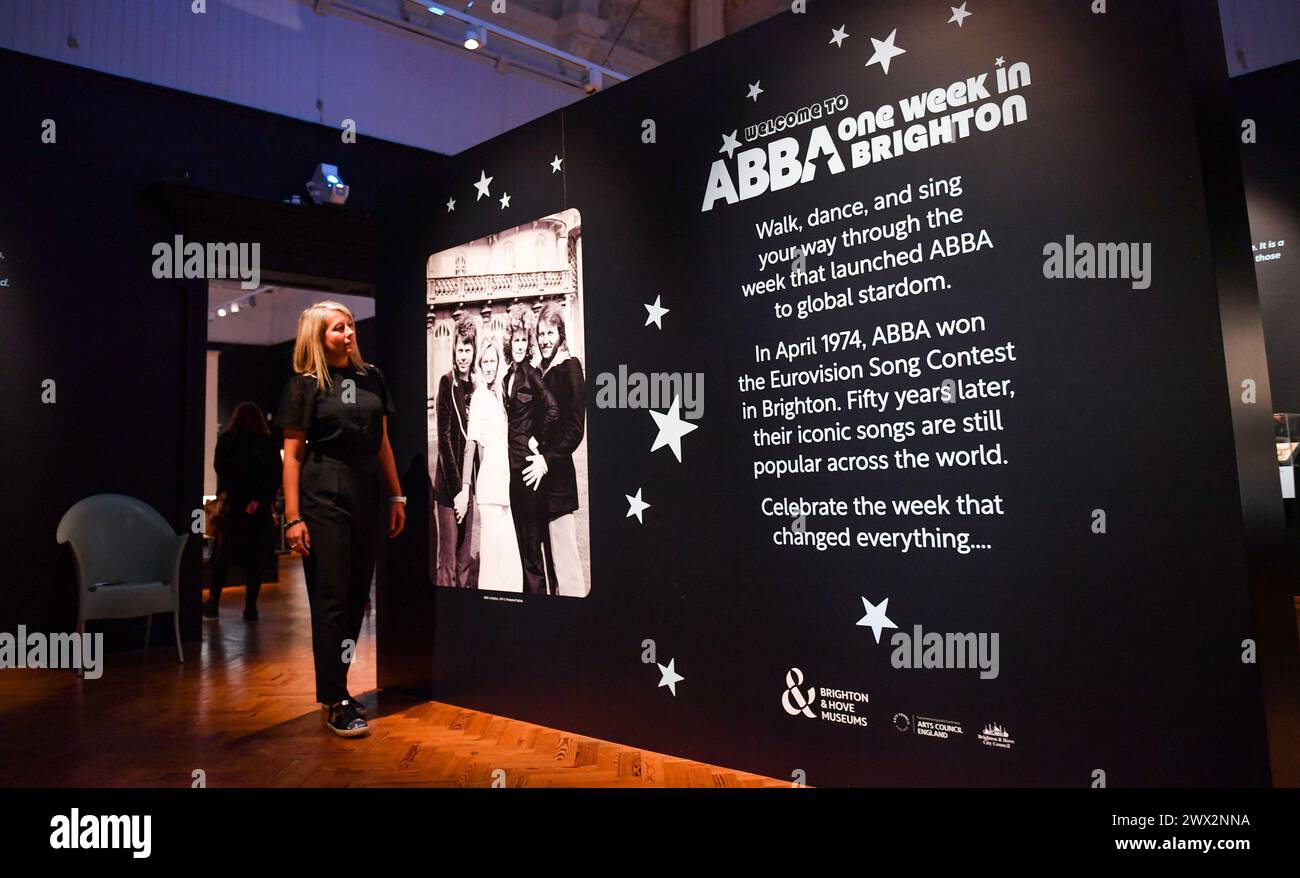 Brighton UK 27th March 2024 -  Jody East curator from Brighton & Hove Museums at the ABBA: One Week in Brighton exhibition press day at Brighton Museum celebrating fifty years since Abba won the Eurovision Song Contest . The exhibition opens to the public tomorrow Thursday 28th March: Credit Simon Dack / Alamy Live News Stock Photo