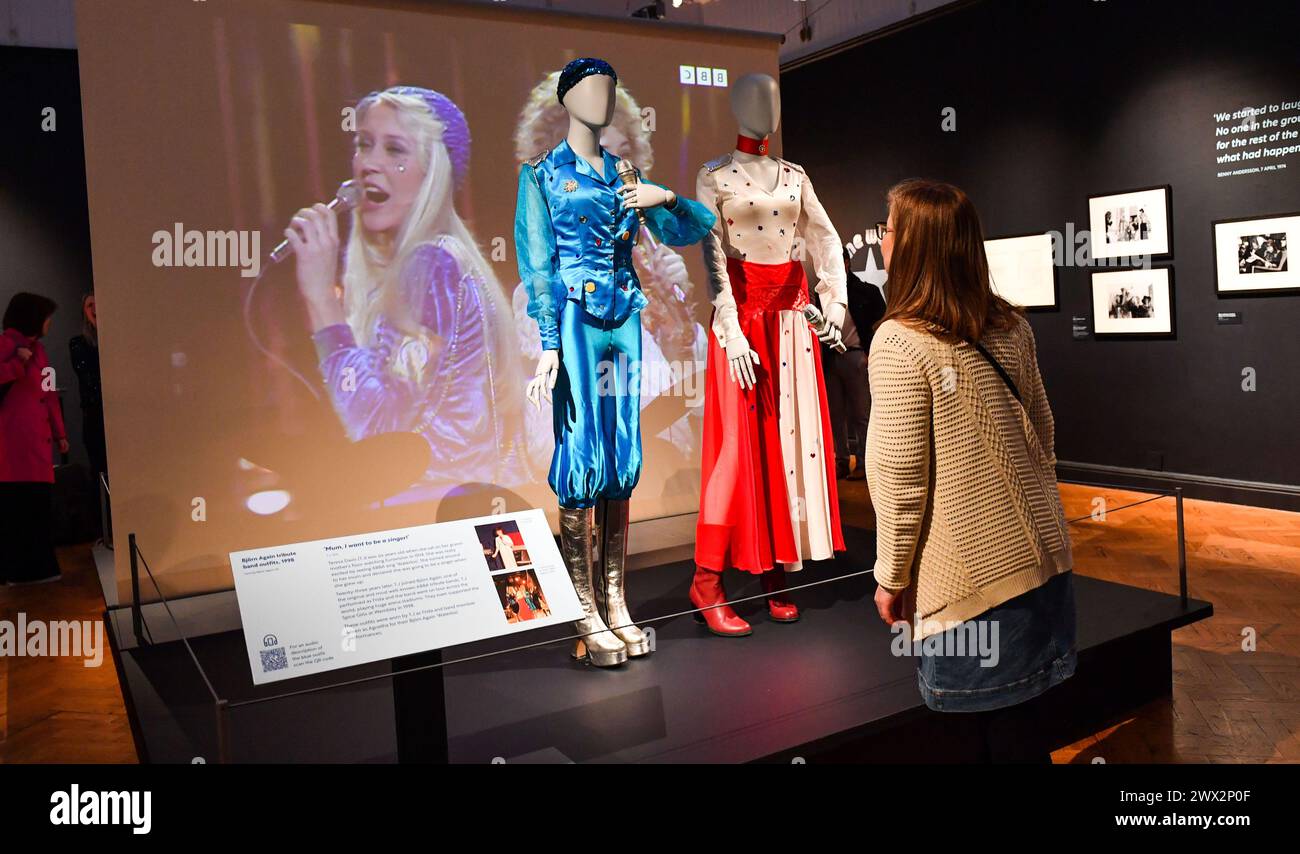 Brighton UK 27th March 2024 -  Outfits worn by the Abba tribute band Bjorn Again on display at the ABBA: One Week in Brighton exhibition press day at Brighton Museum celebrating fifty years since they won the Eurovision Song Contest . The exhibition opens to the public tomorrow: Credit Simon Dack / Alamy Live News Stock Photo