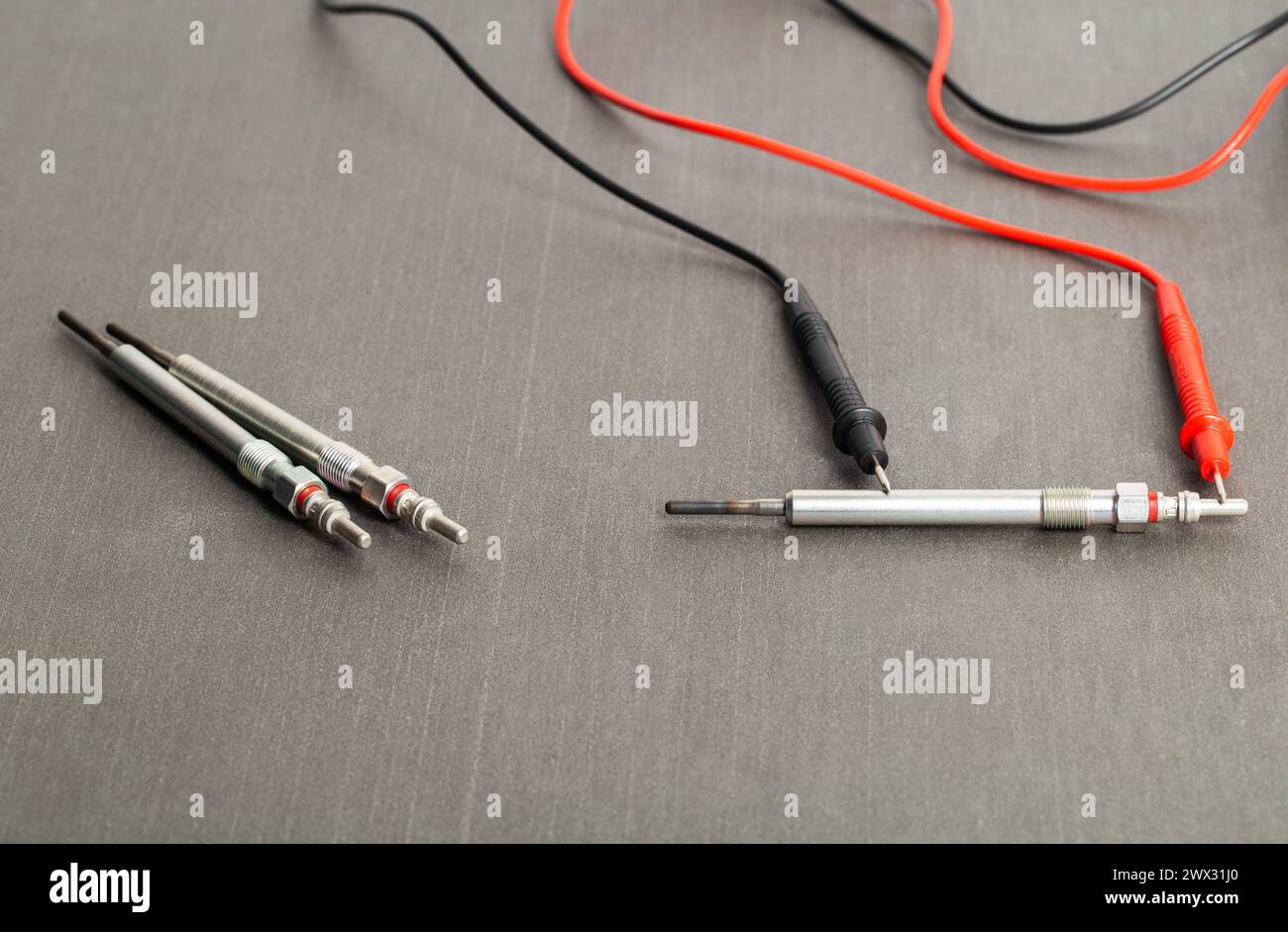Checking the serviceability of the glow plug with a multimeter. Glow