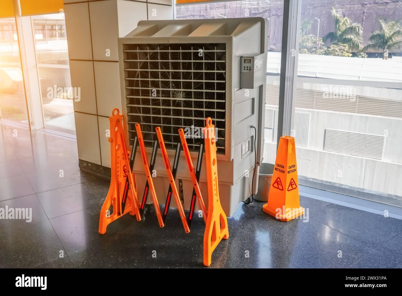 Portable air conditioner or mobile air cooler in modern public place