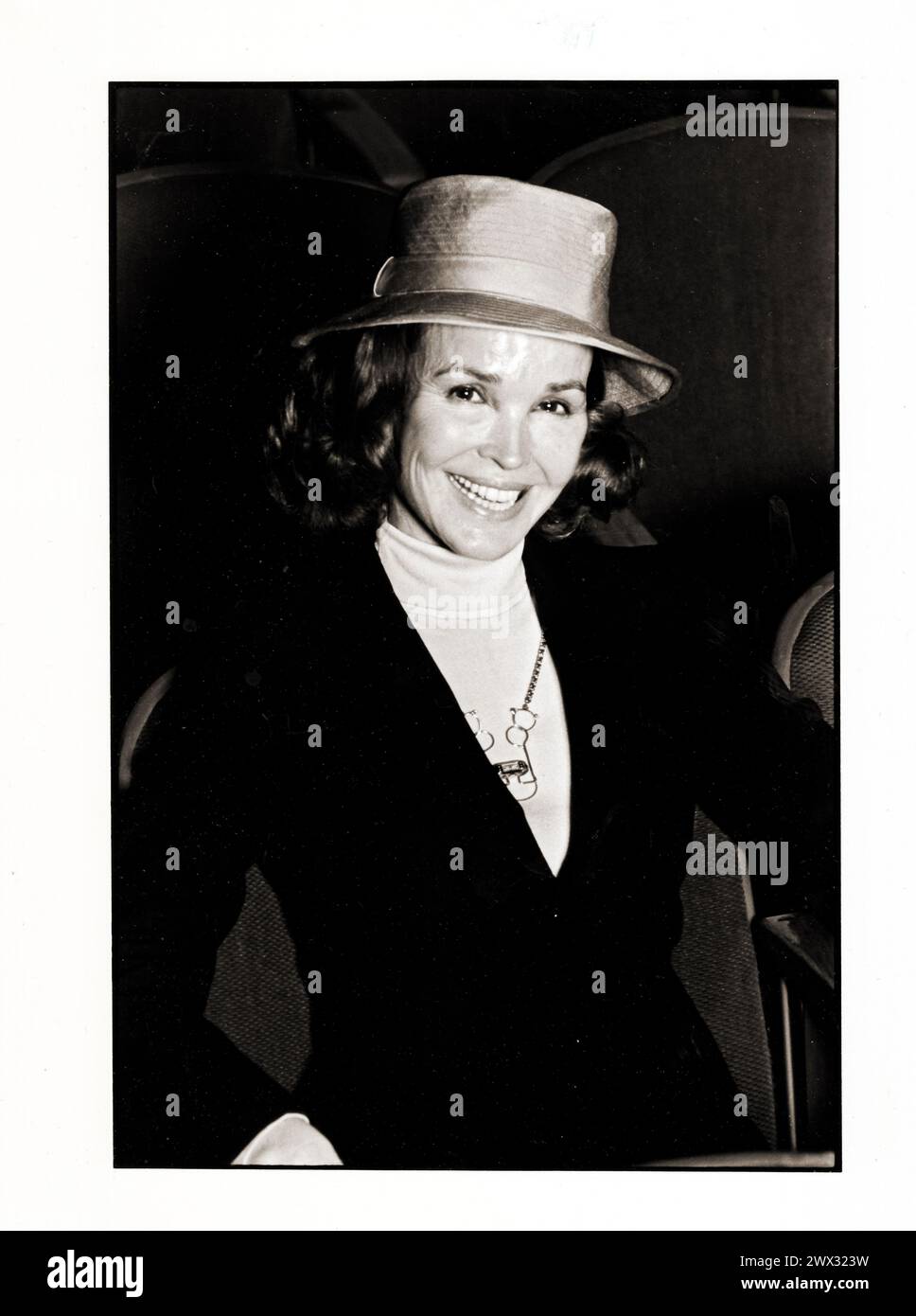 A posed portrait of Kathryn Crosby who was Bing Crosby's second wife. At a theater in Birmingham, Michigan where she was performing in a play. She was wearing Bing's hat. She performed in films under the stage names Kathryn Grant and Kathryn Grandstaff. Circa 1978. Stock Photo