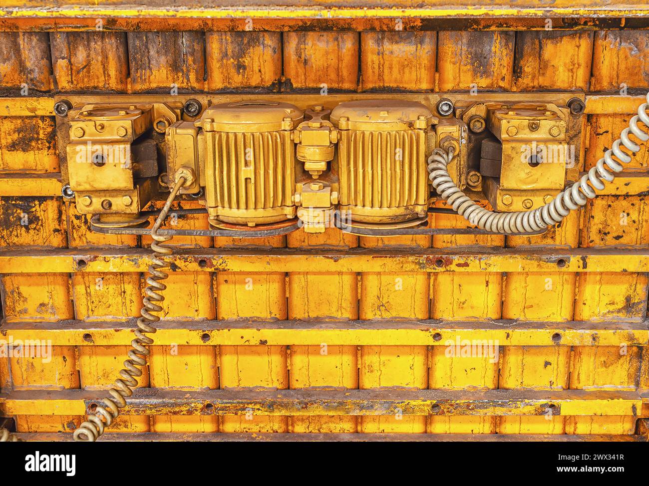 Rear view of old electric motors from industrial machines. Vintage industrial equipment