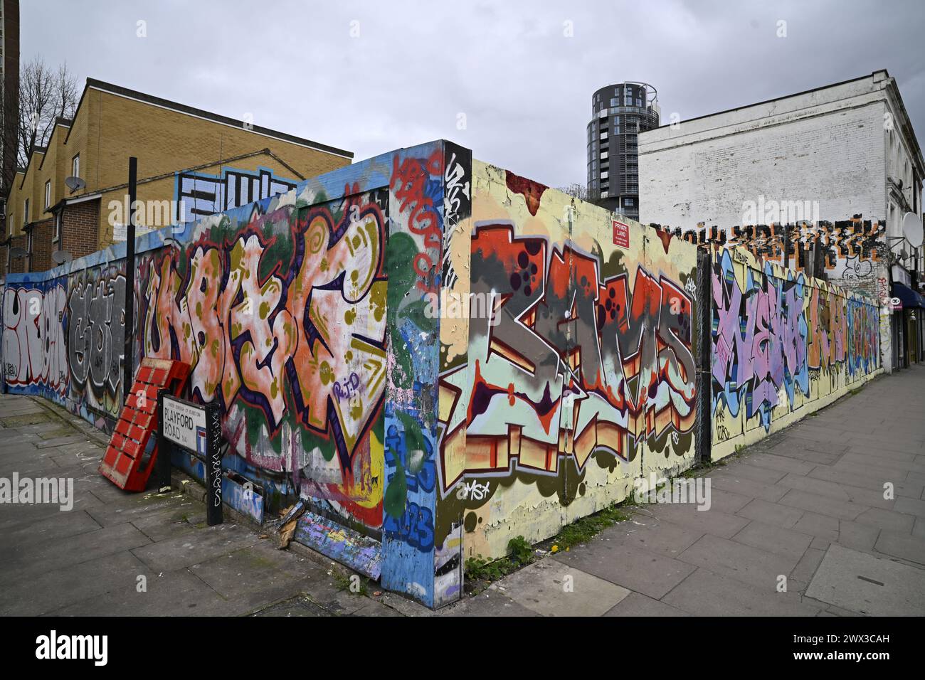 Software Development Graffiti A development site hoarding covered in graffiti in Finsbury Park London ...