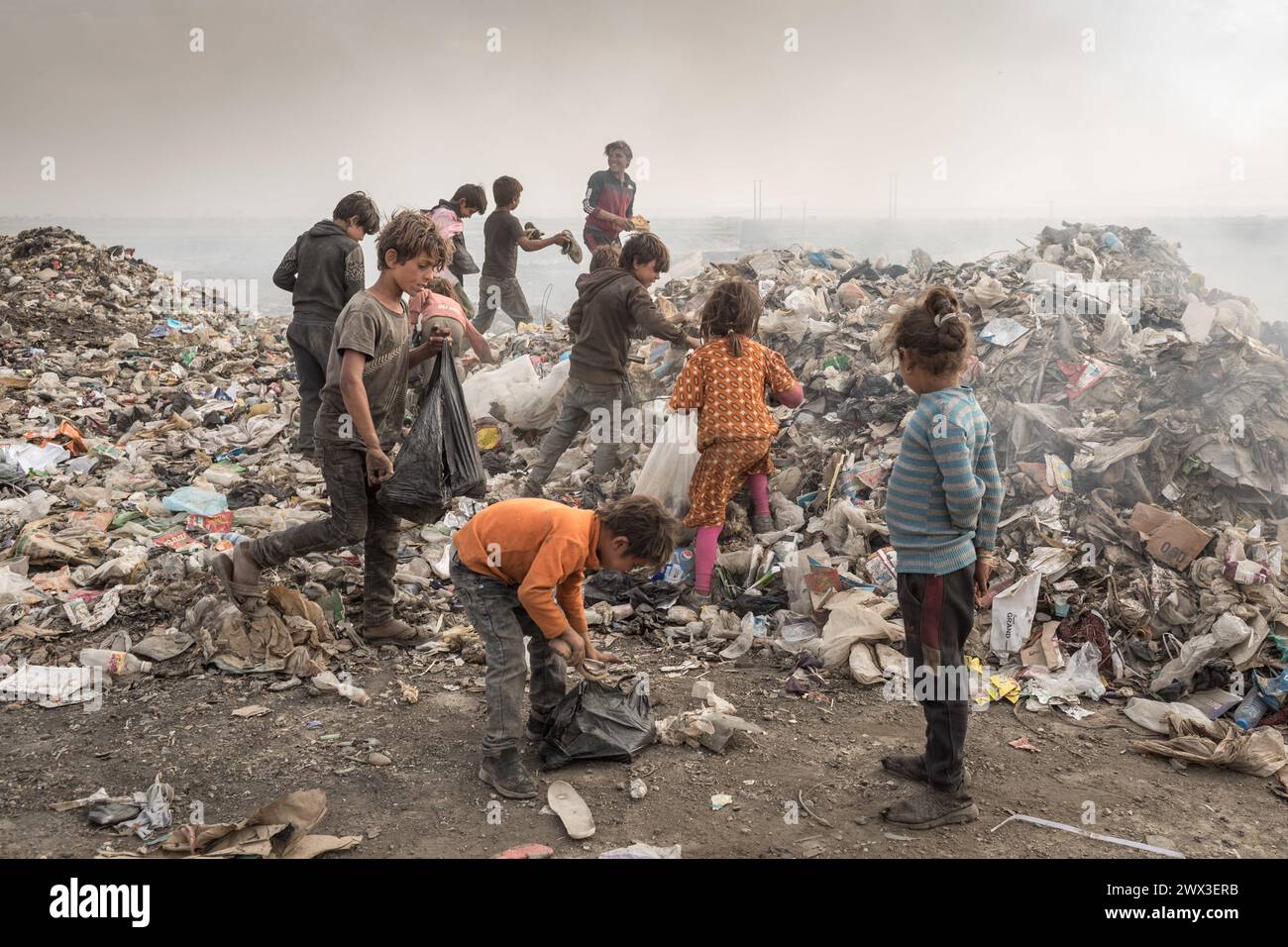 Children live in squalid hi-res stock photography and images - Alamy