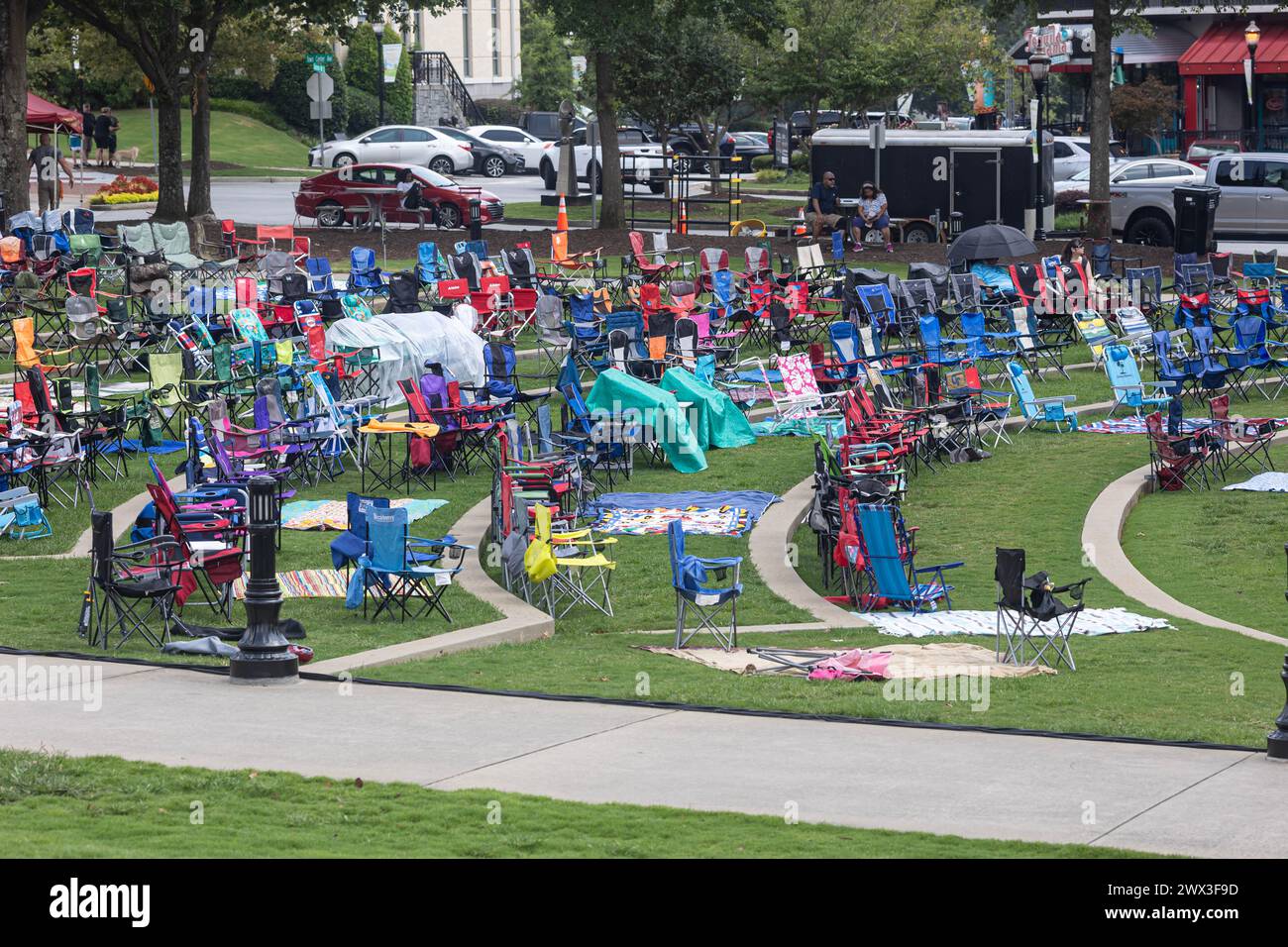 Suwanee, GA / USA August 12, 2023 Dozens of empty lawn chairs are
