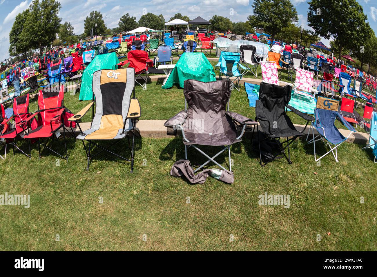 Suwanee, GA / USA August 12, 2023 Dozens of empty lawn chairs are