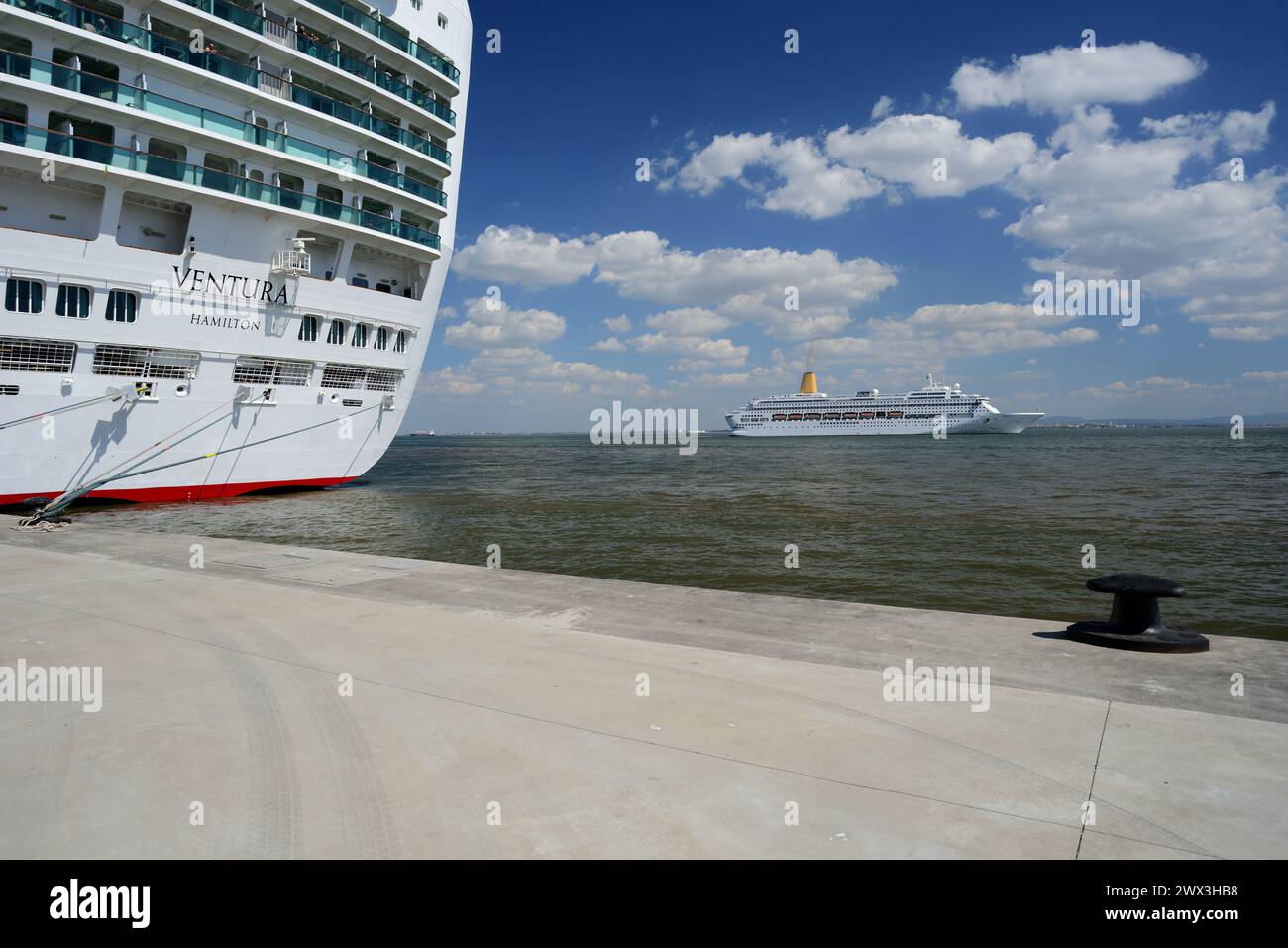 P&O cruise ship Ventura moored at Lisbon as P&O cruise ship Oriana departs. Stock Photo